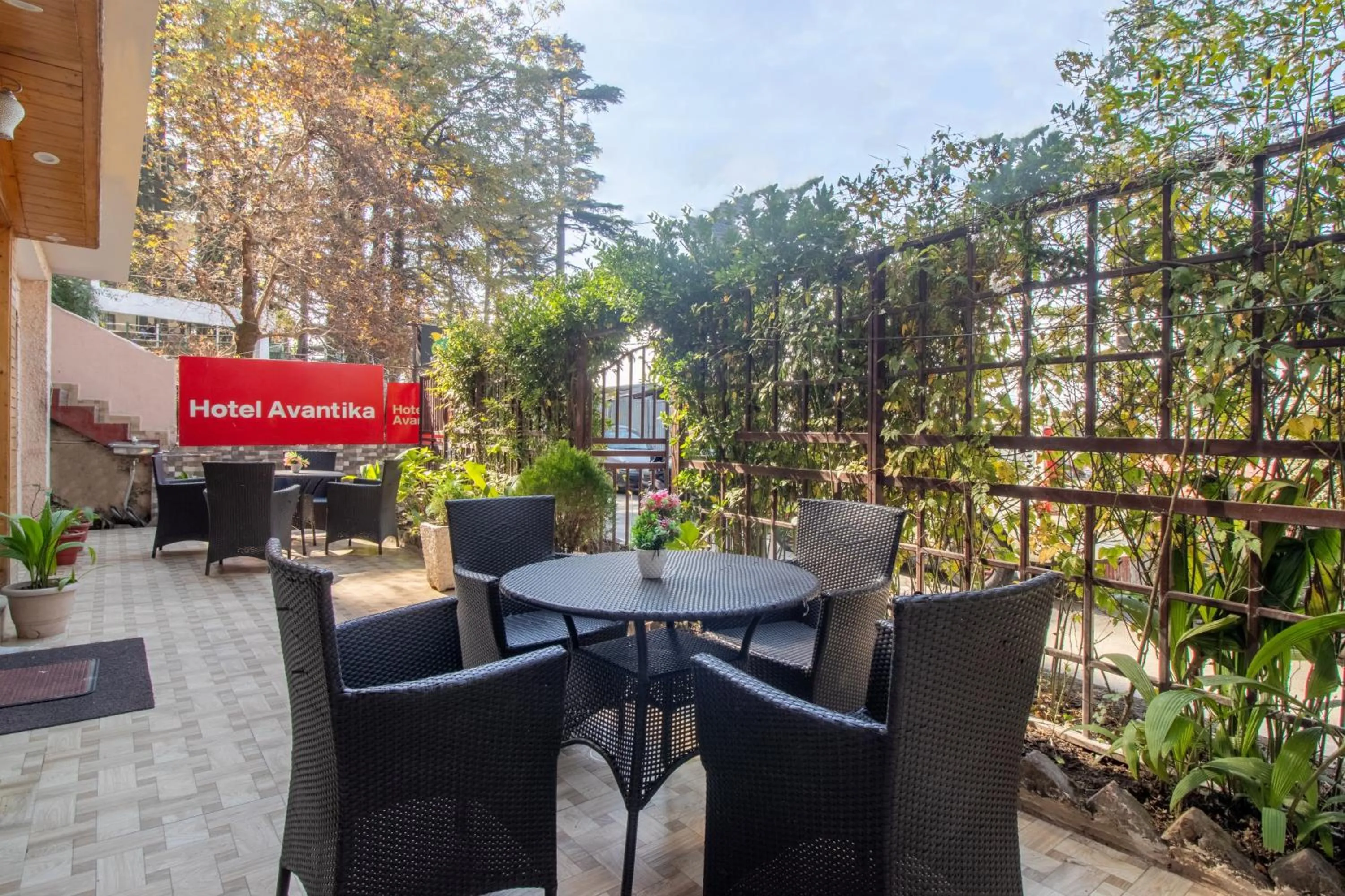 Seating area in Itsy Hotels Avantika With Forest View