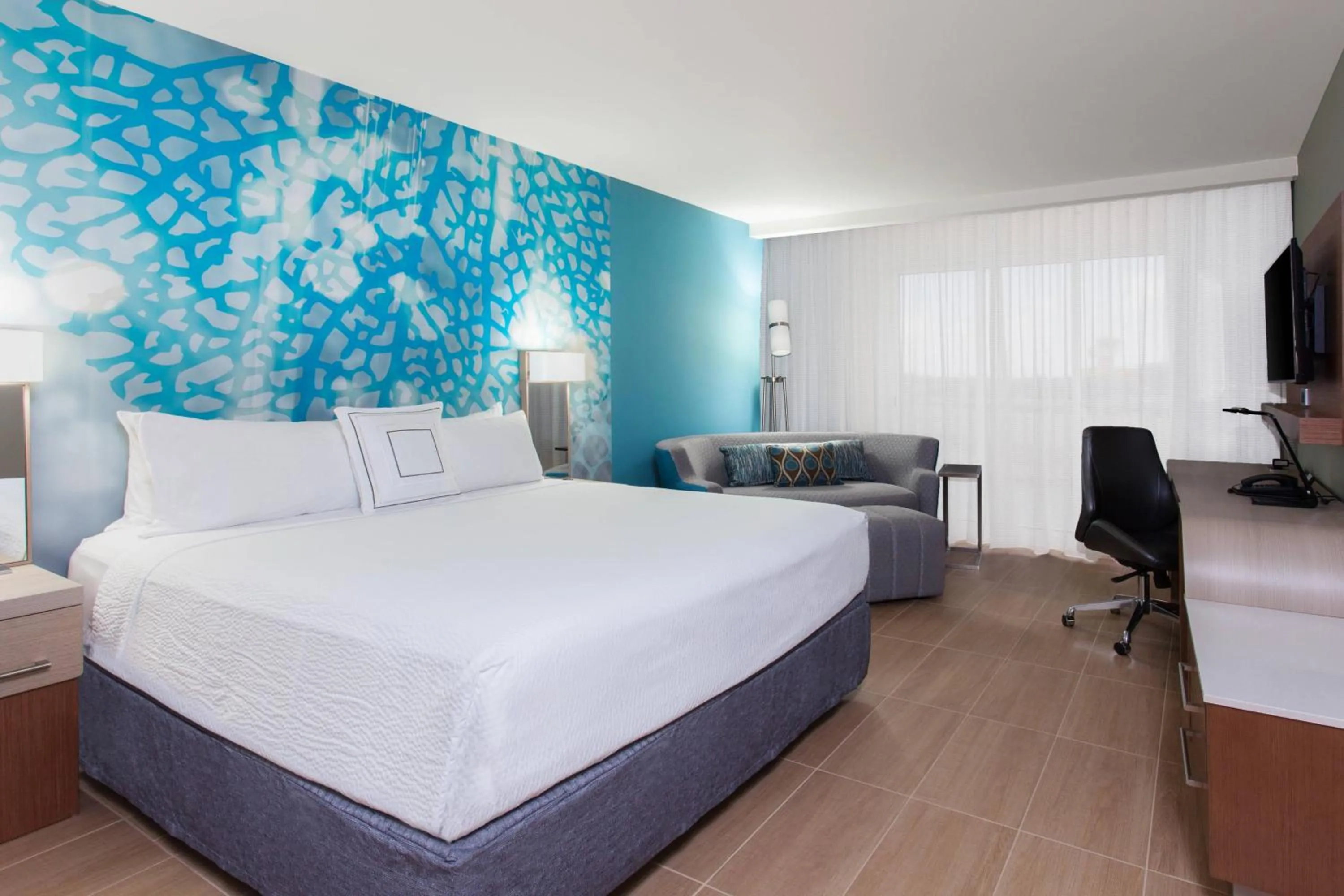 Photo of the whole room, Bed in Courtyard by Marriott Bonaire Dive Resort