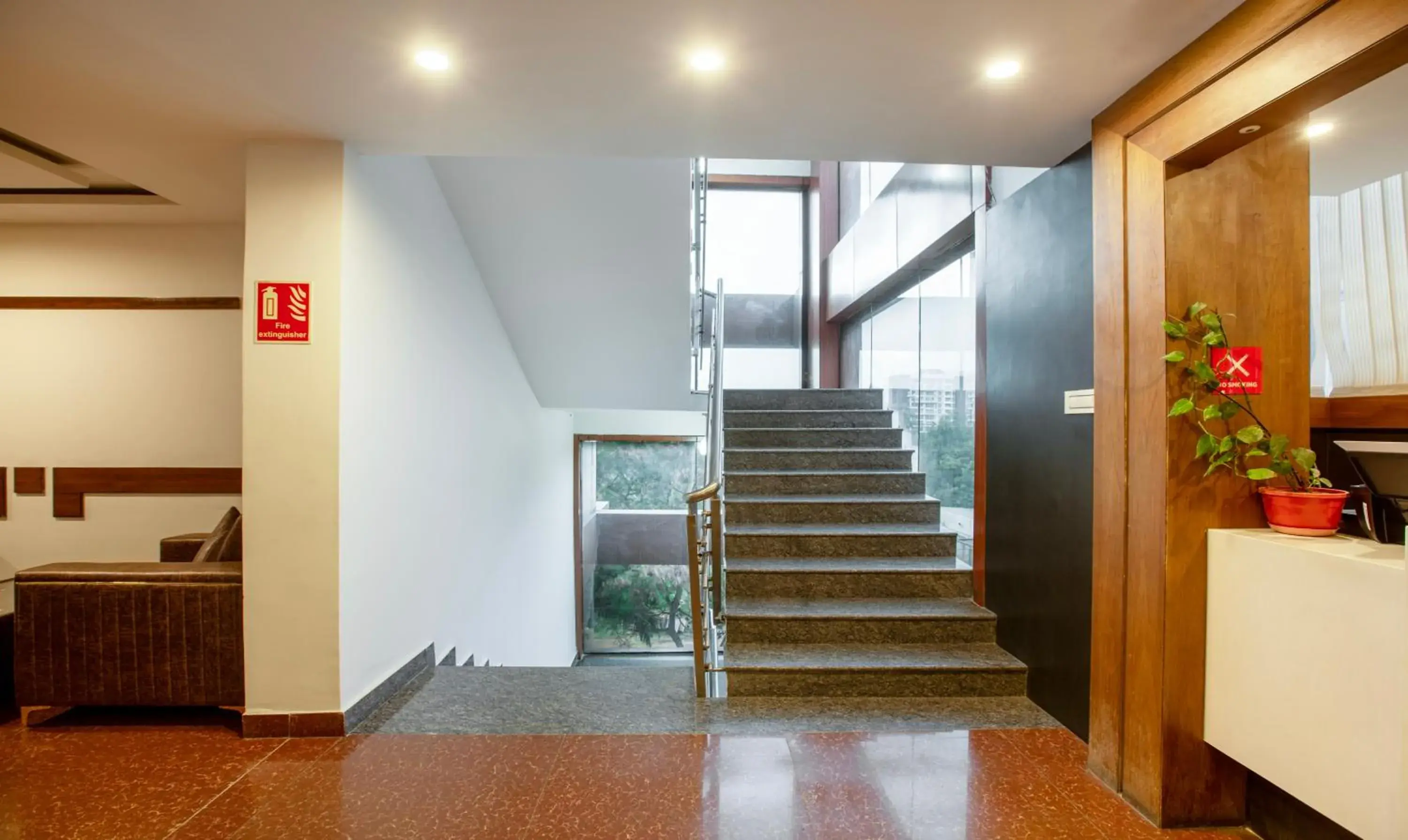 Lobby or reception in Treebo New Plus Point Lobby or reception in Treebo New Plus Point