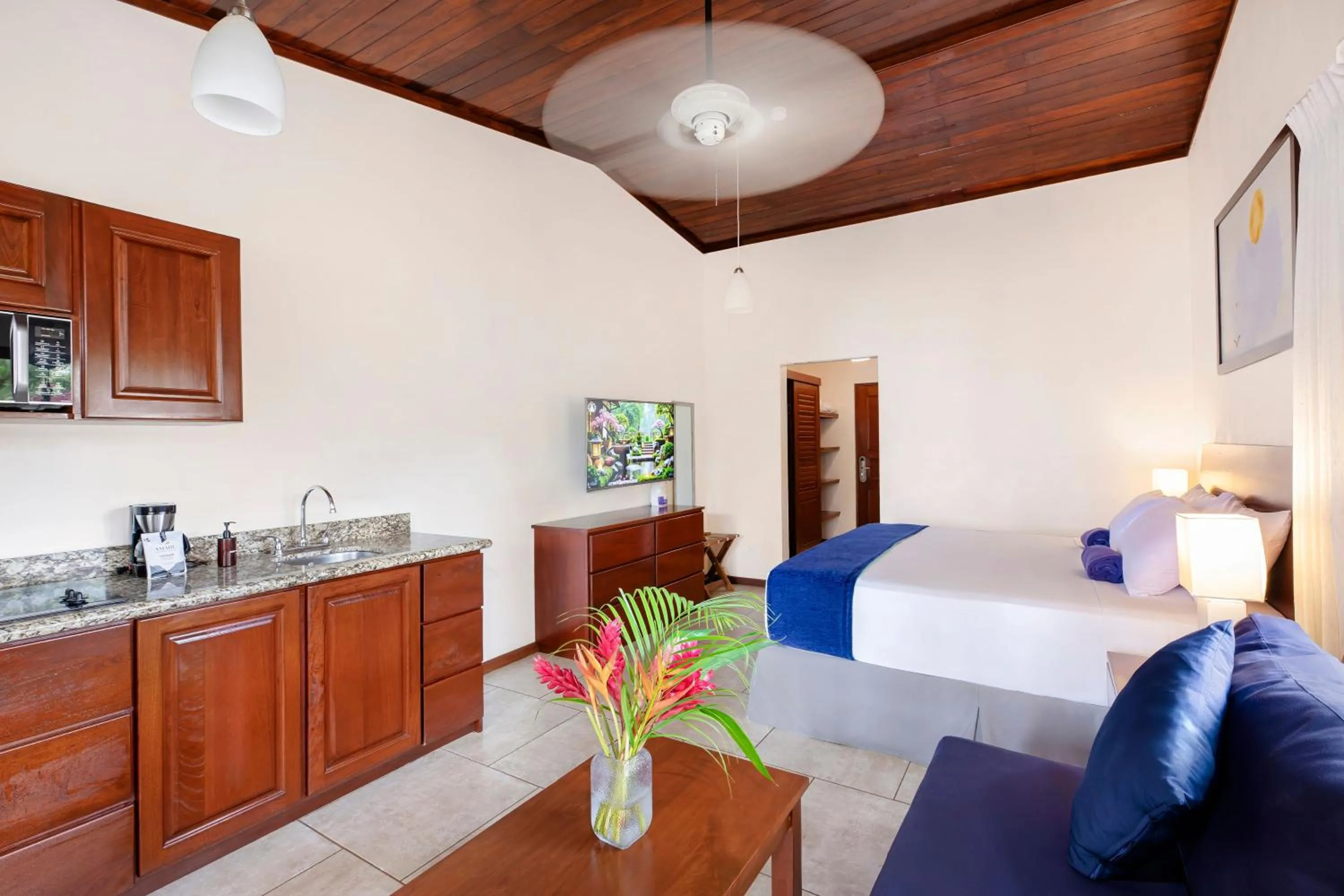 Bed in The Coast Beachfront Hotel