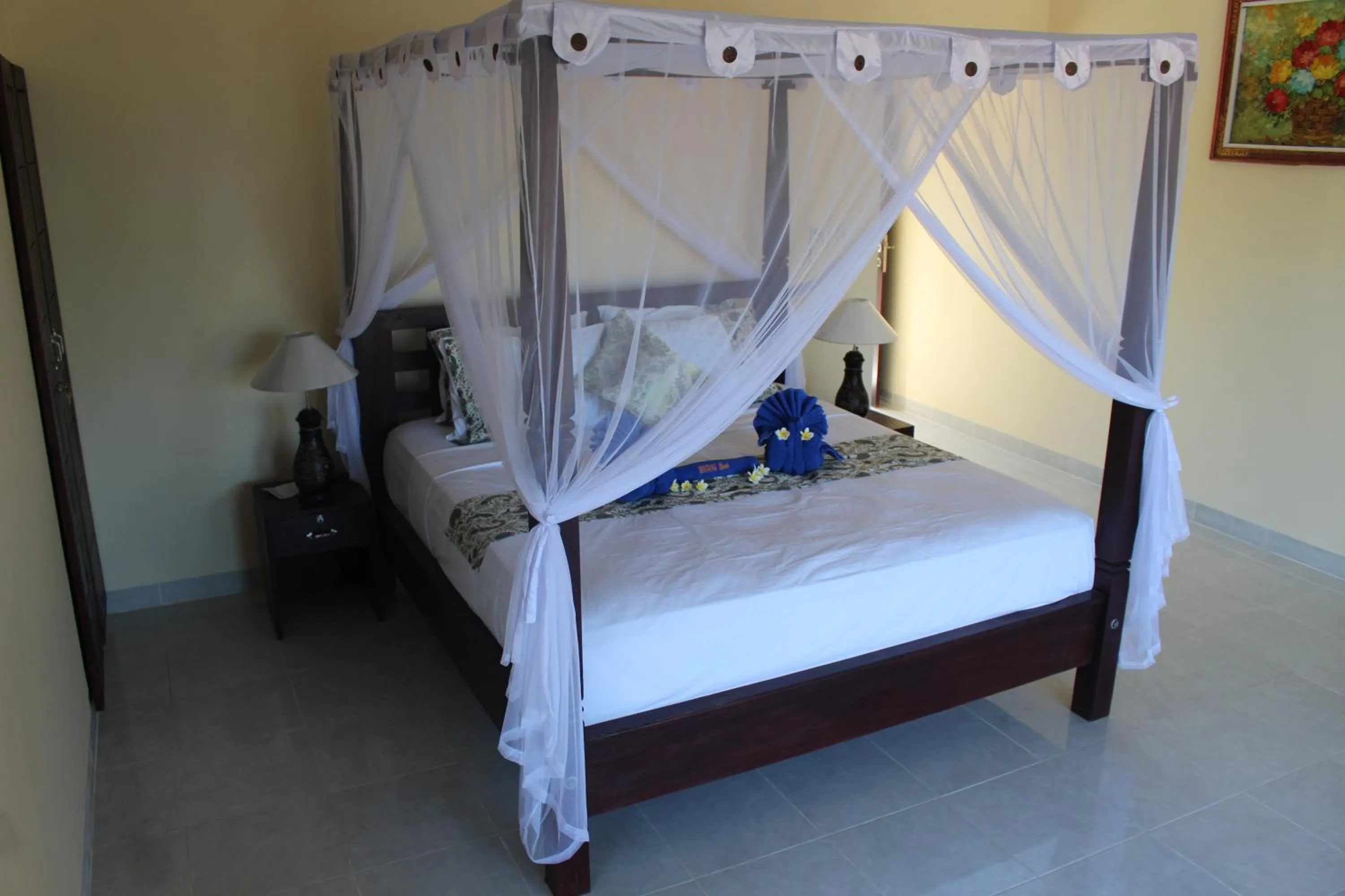 Bed in Bintang Beach Villa