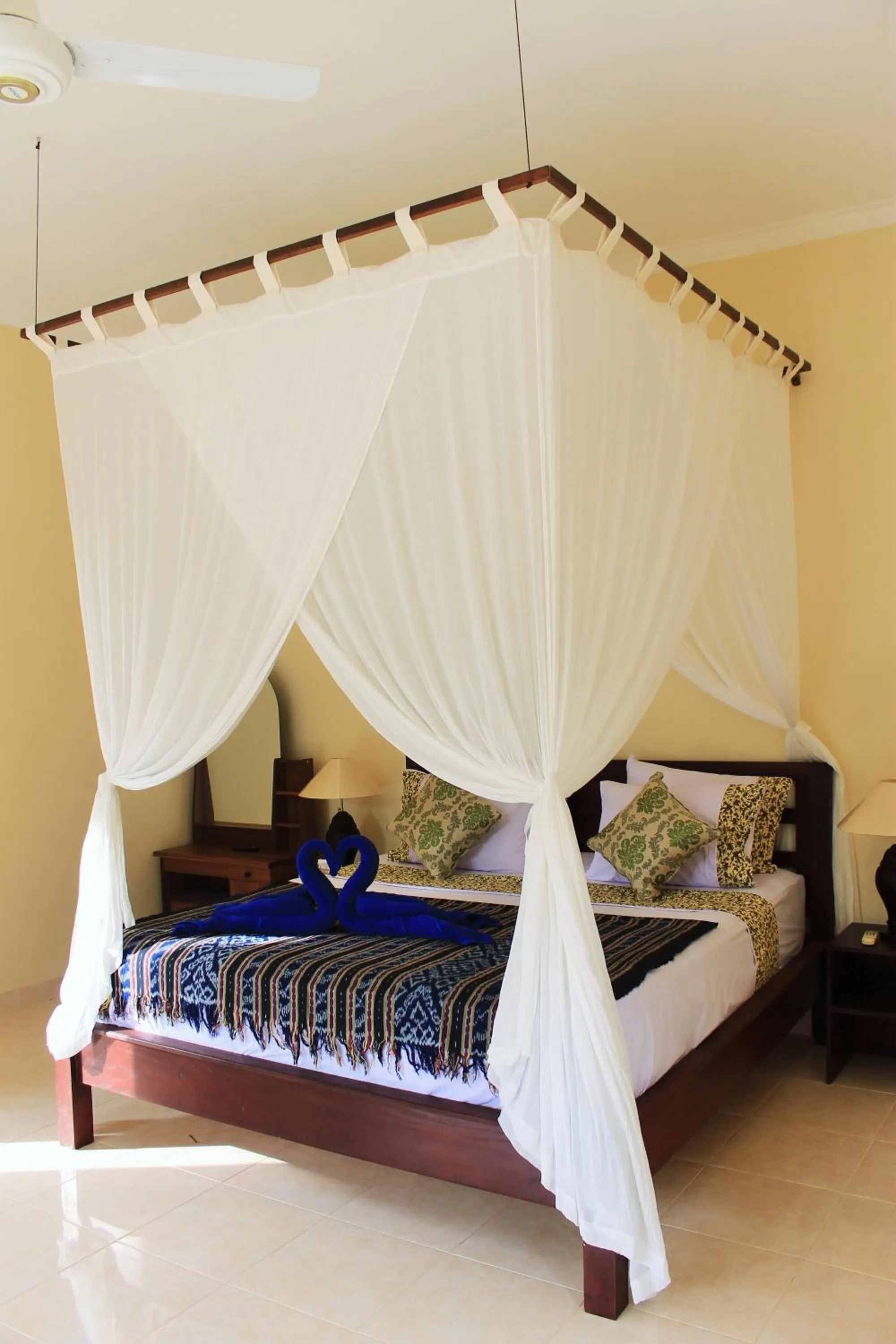 Bed in Bintang Beach Villa