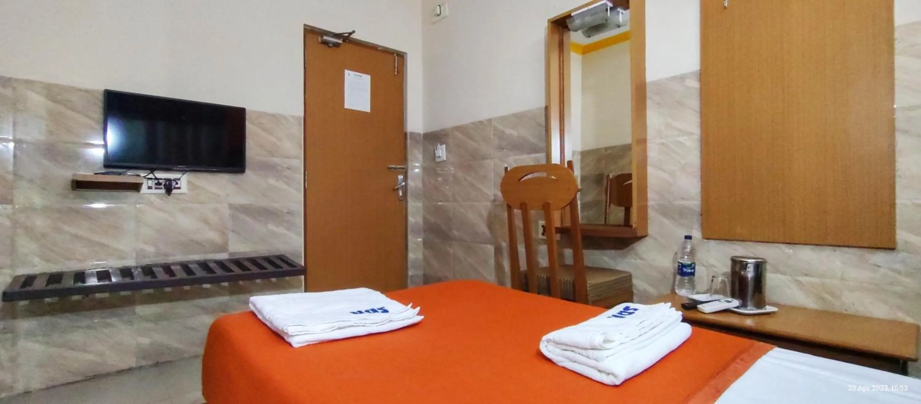 Bed in Sarovara Deluxe Rooms