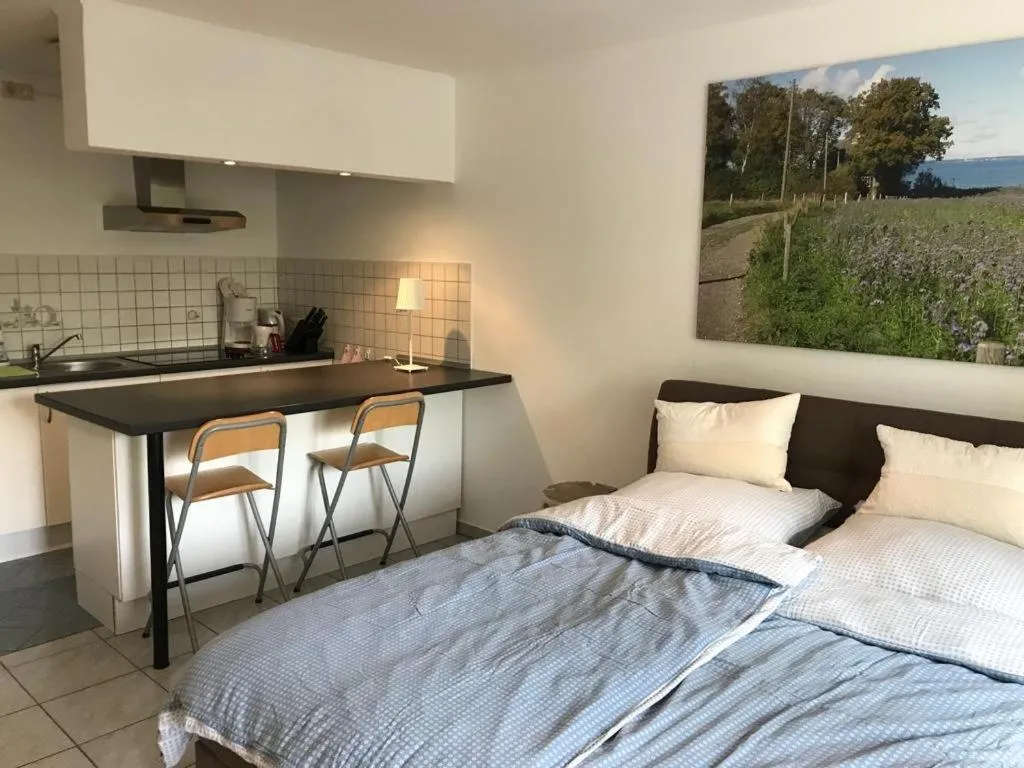 Bed in Ferienwohnung am Mühlenpark