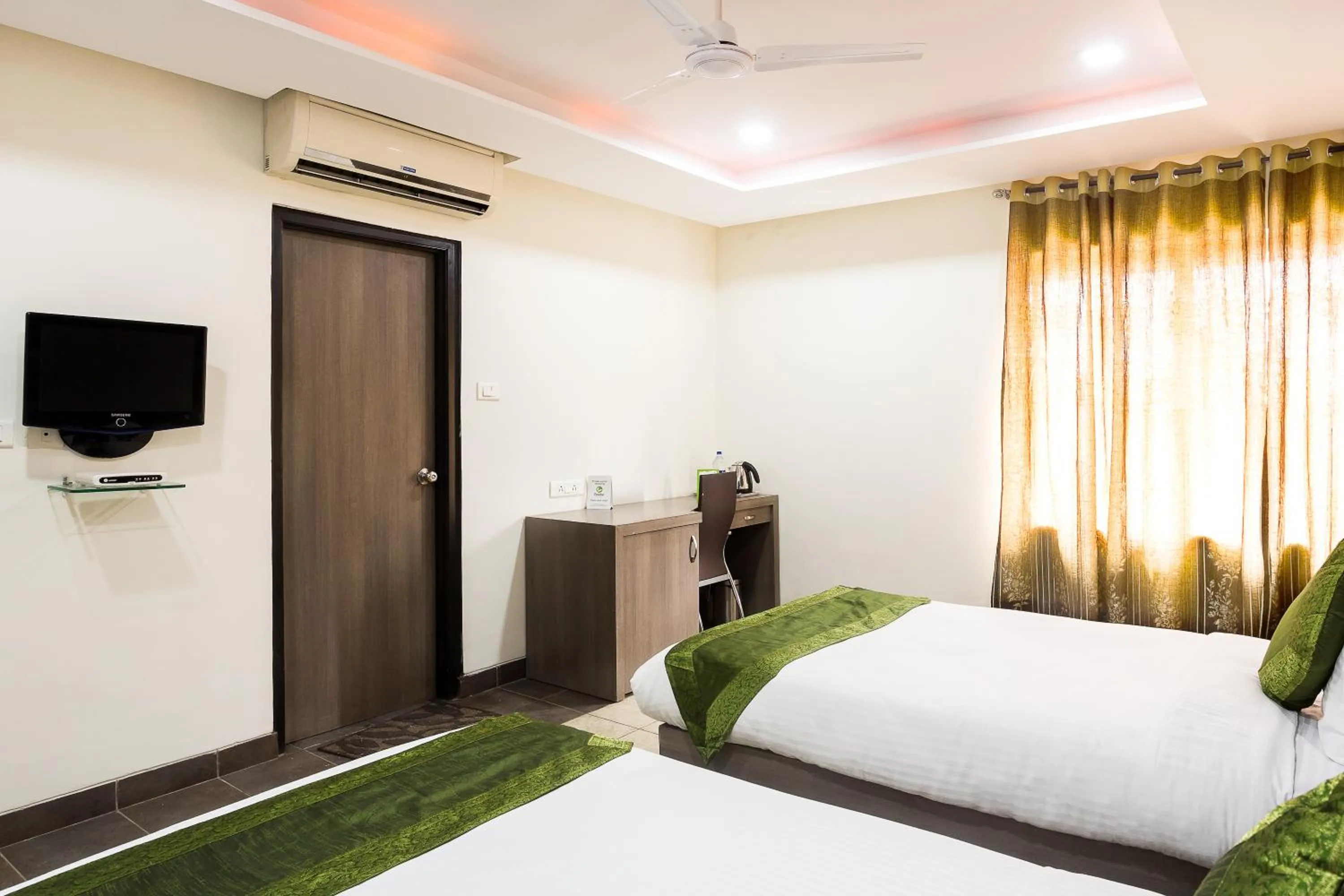 Bedroom, Bed in Treebo Fort Club