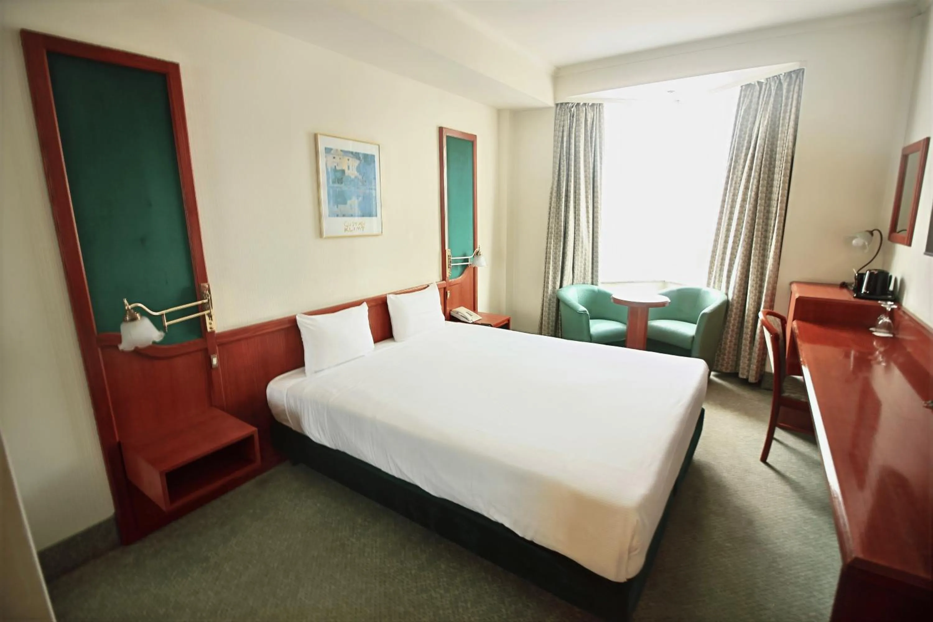 Bed in Hotel Le Dome