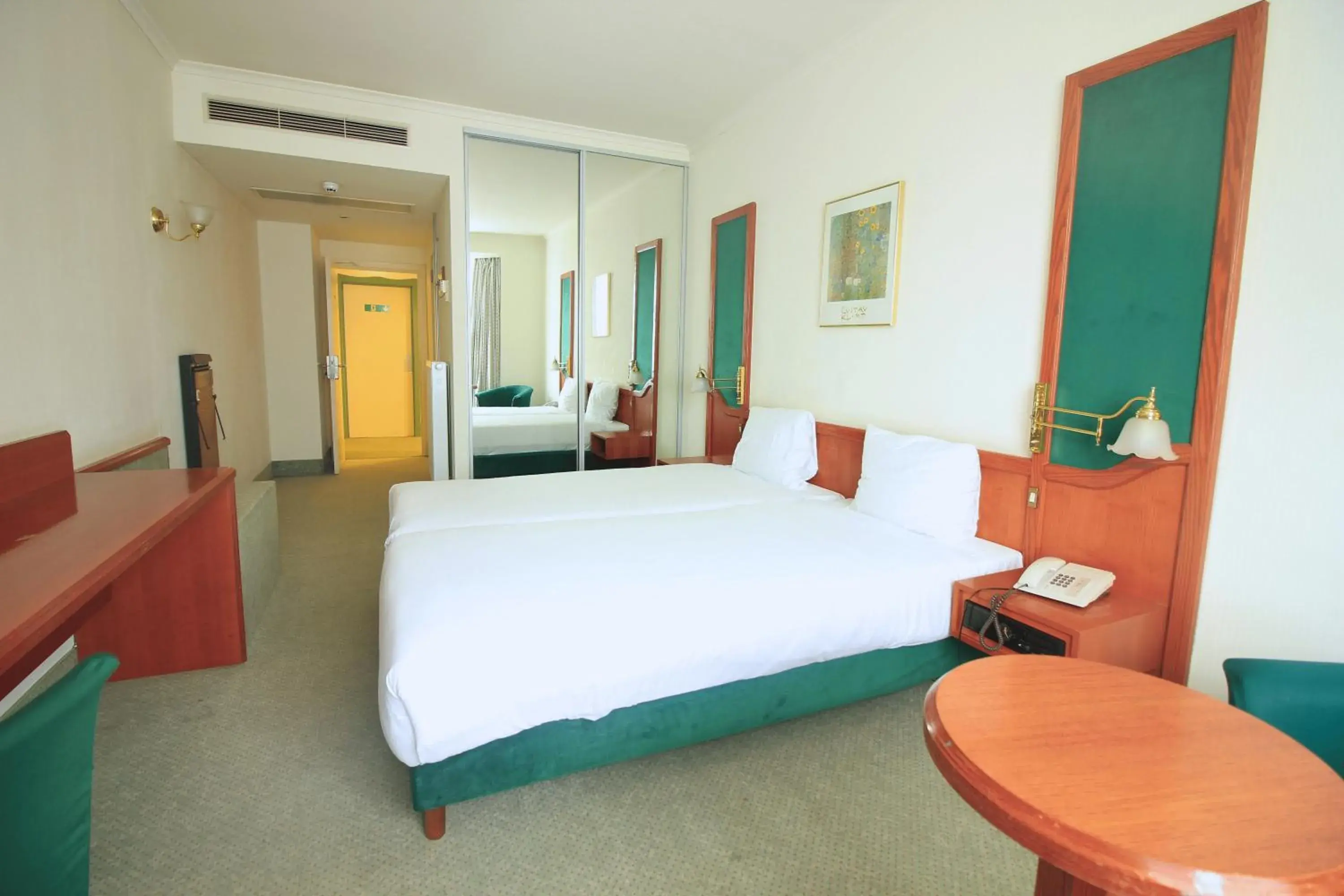 Bed in Hotel Le Dome Bed in Hotel Le Dome