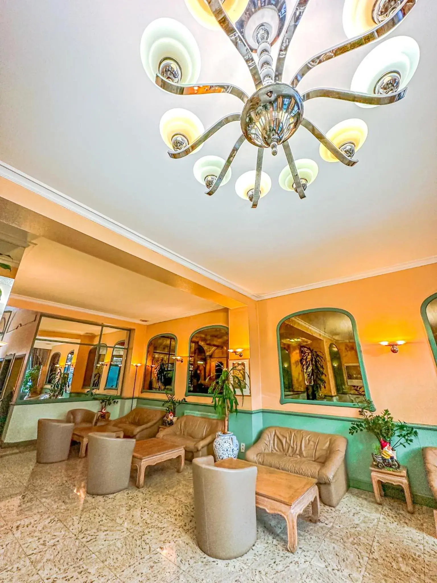 Lobby or reception in Hotel Le Dome Lobby or reception in Hotel Le Dome