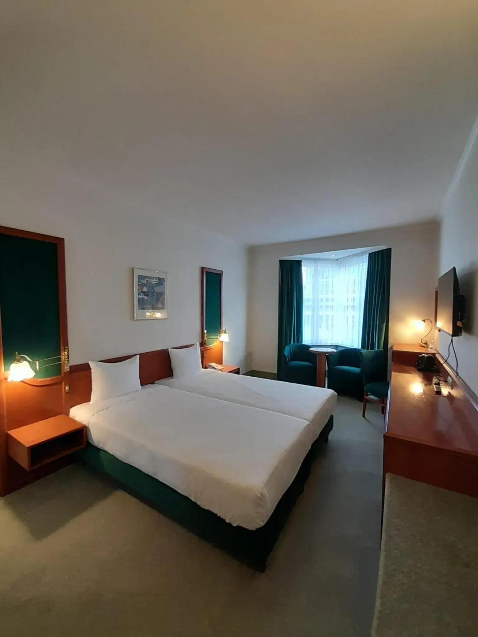 Bed in Hotel Le Dome Bed in Hotel Le Dome