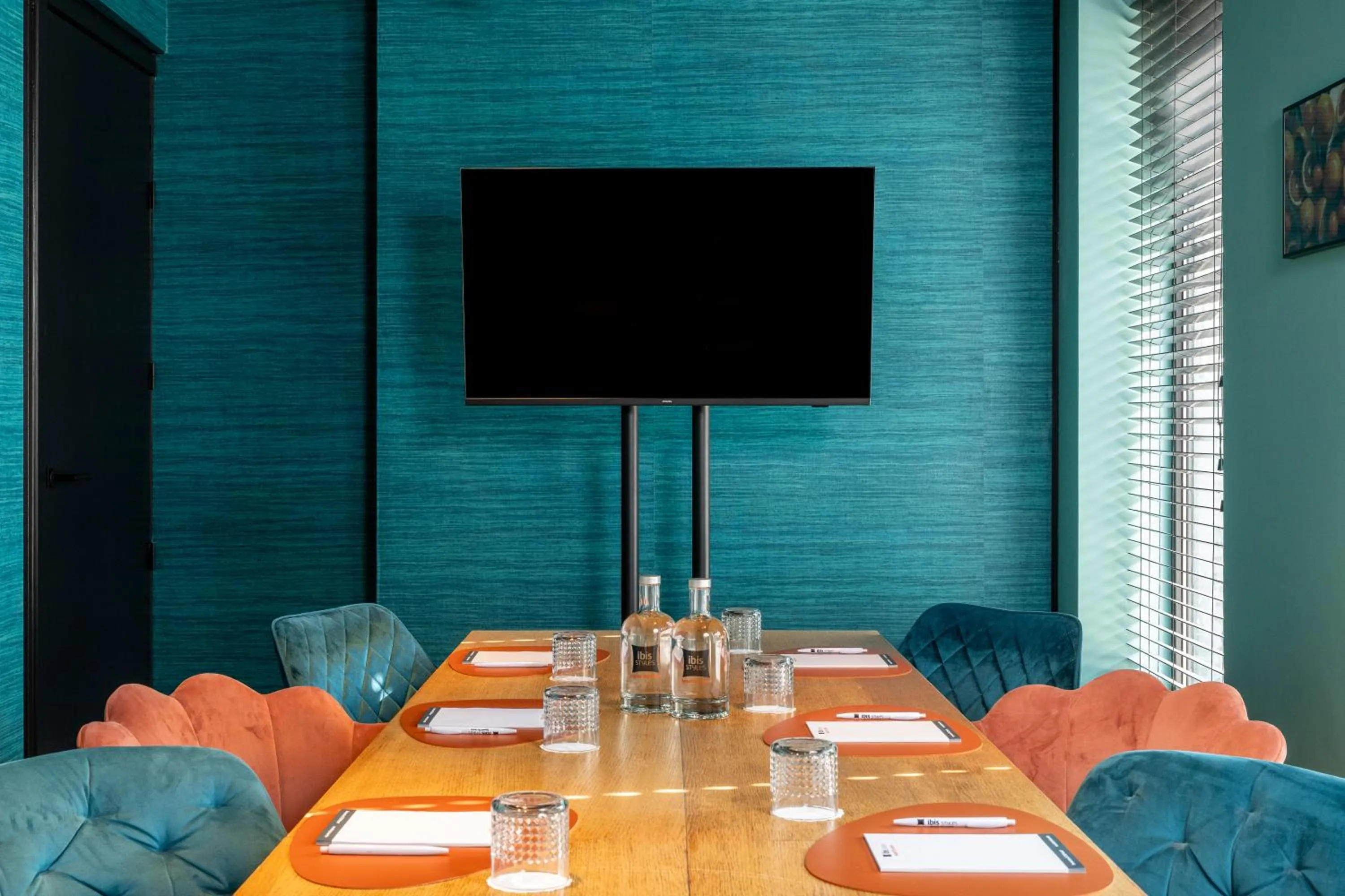 Communal lounge/ TV room in ibis Styles Hasselt City Centre