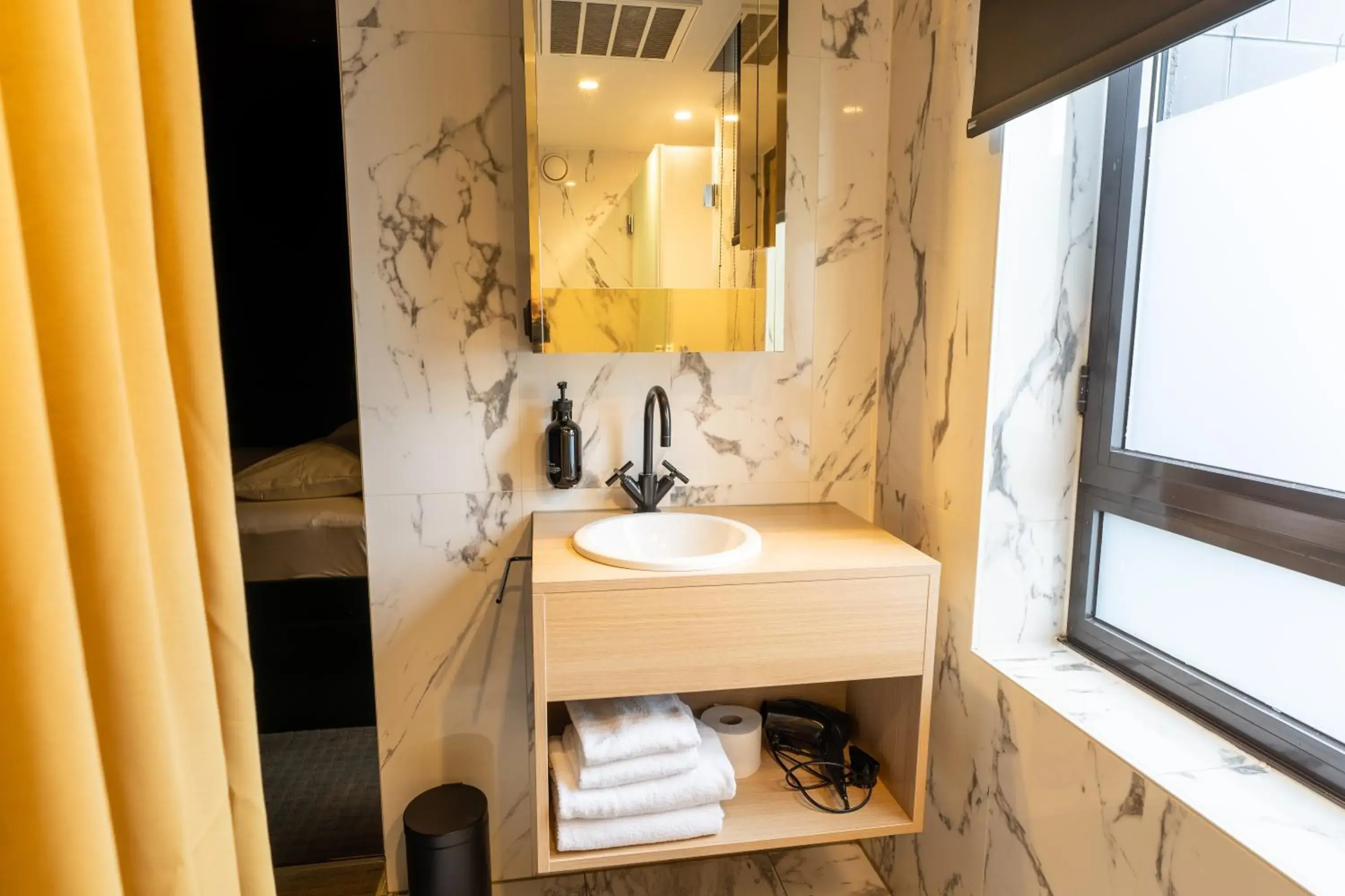 Bathroom in YUP Hotel Bathroom in YUP Hotel