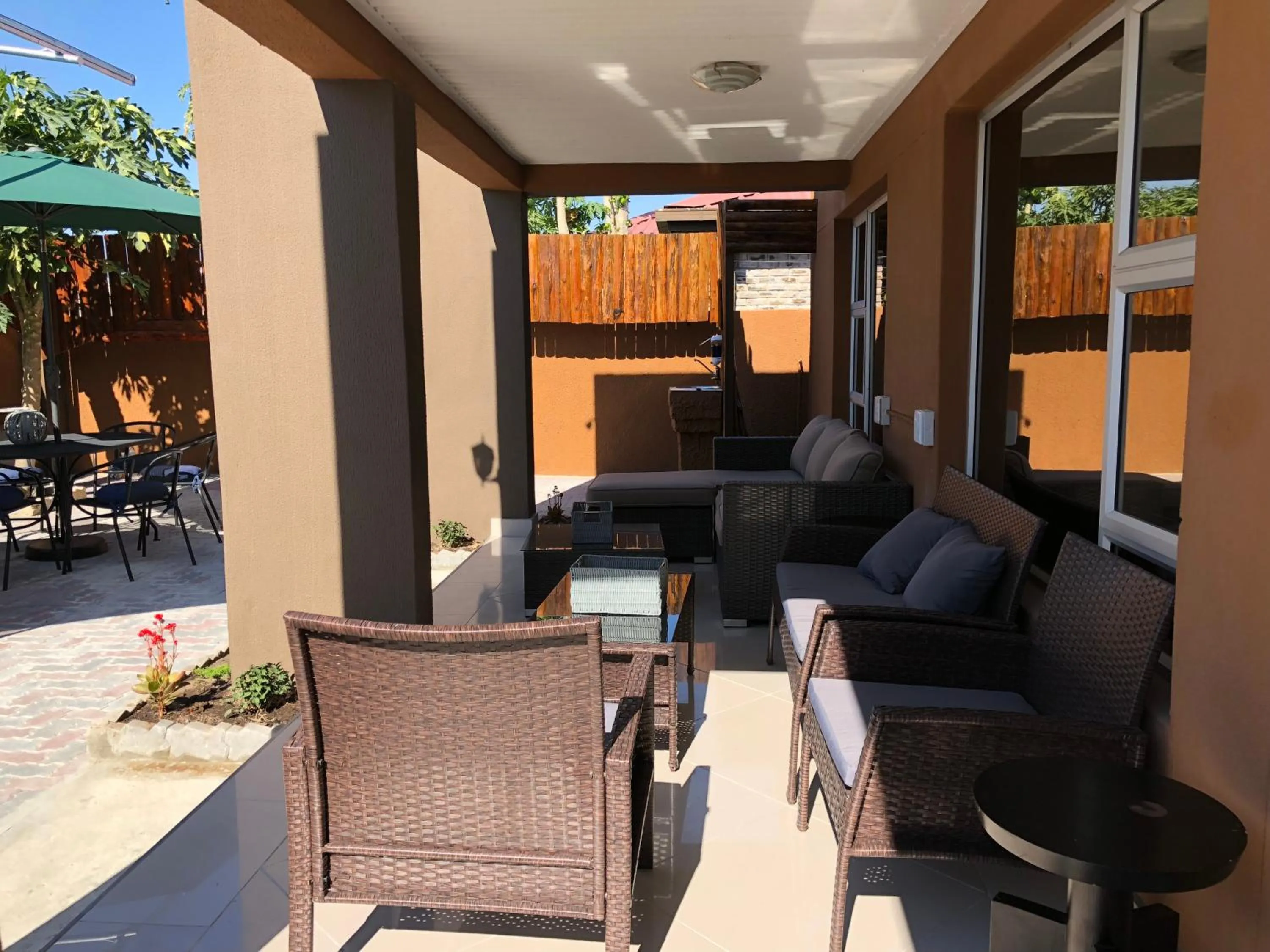 Communal lounge/ TV room in City Lodge Etosha