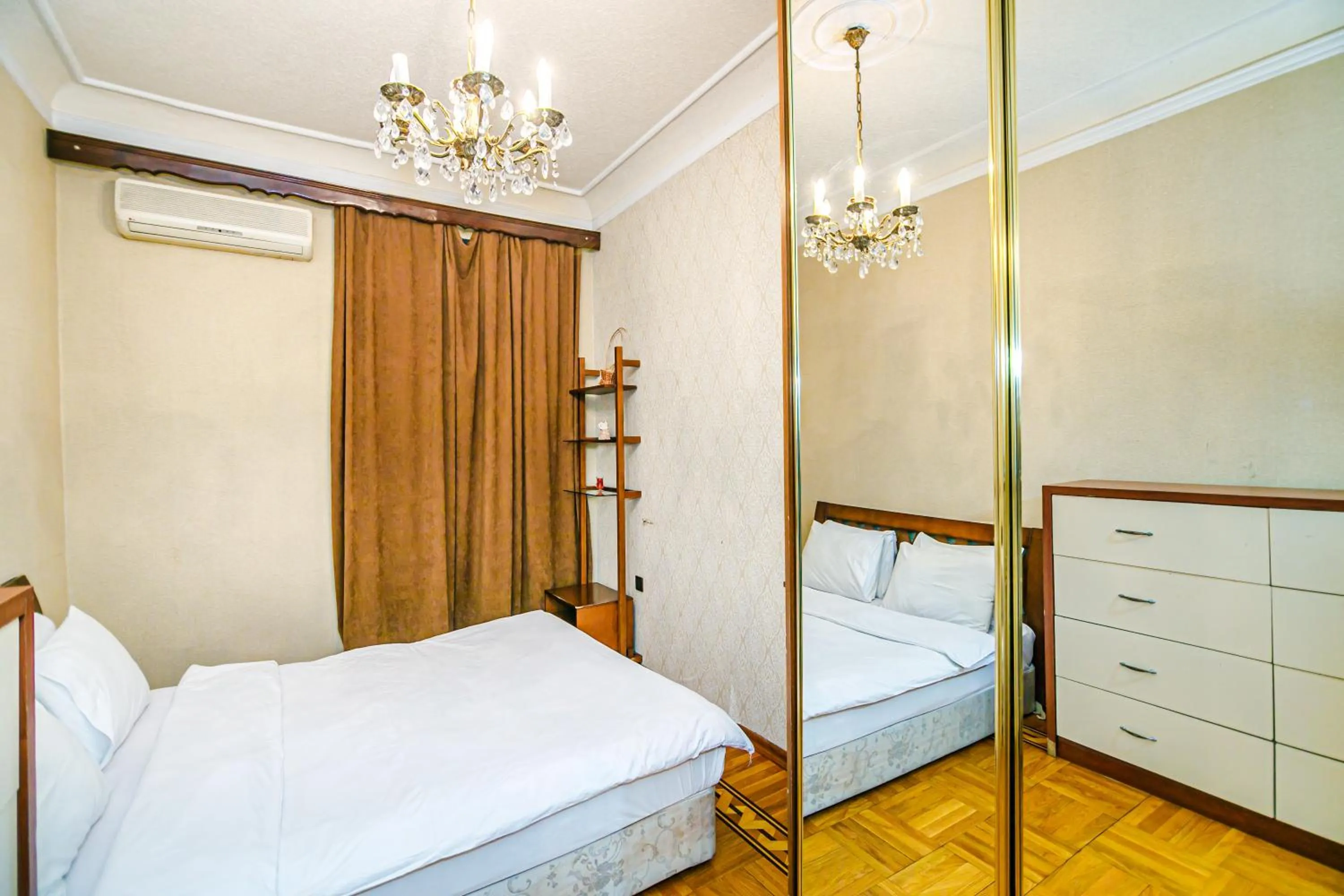 Bedroom in Monolit Apartment