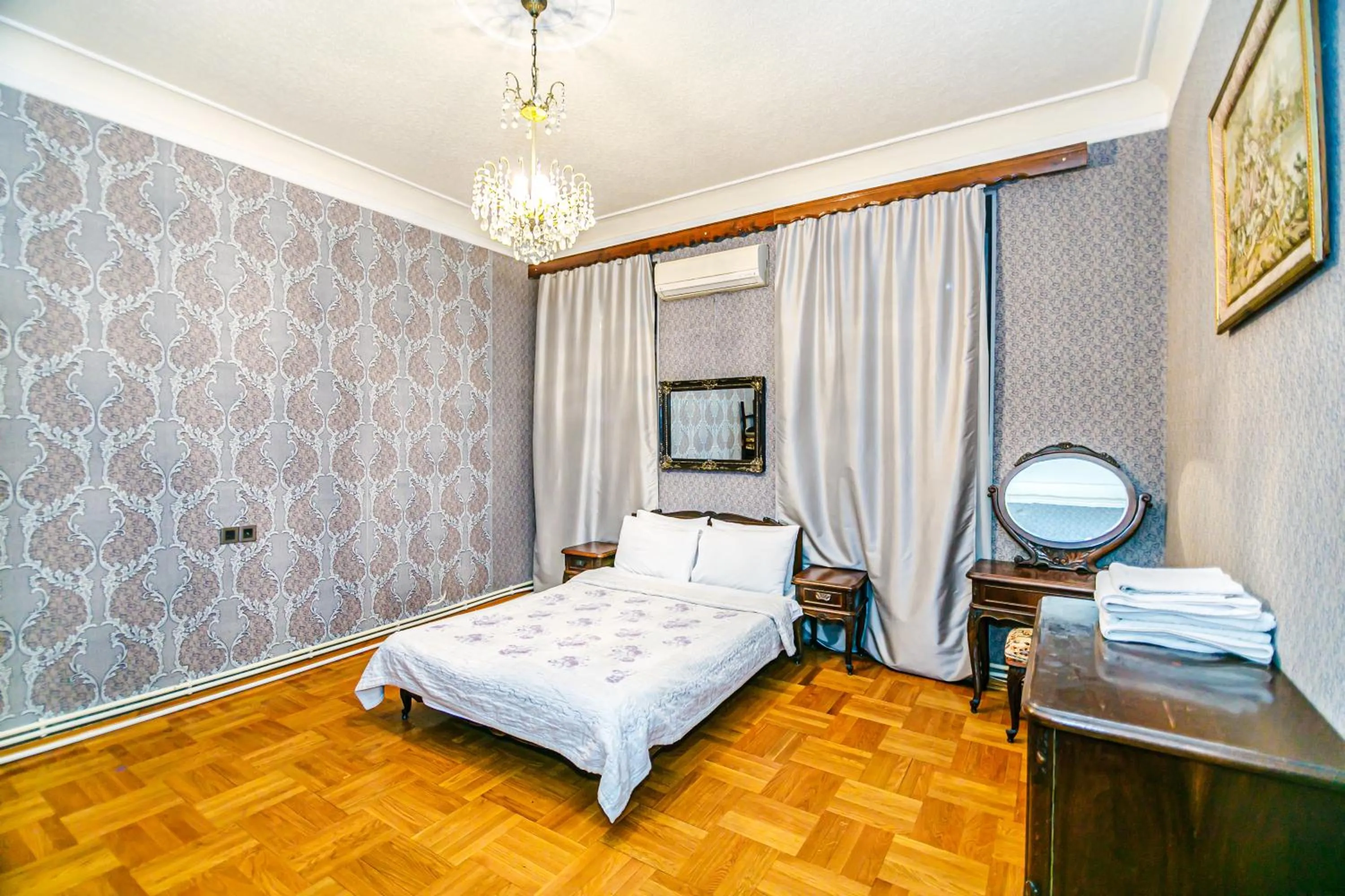 Bedroom in Monolit Apartment