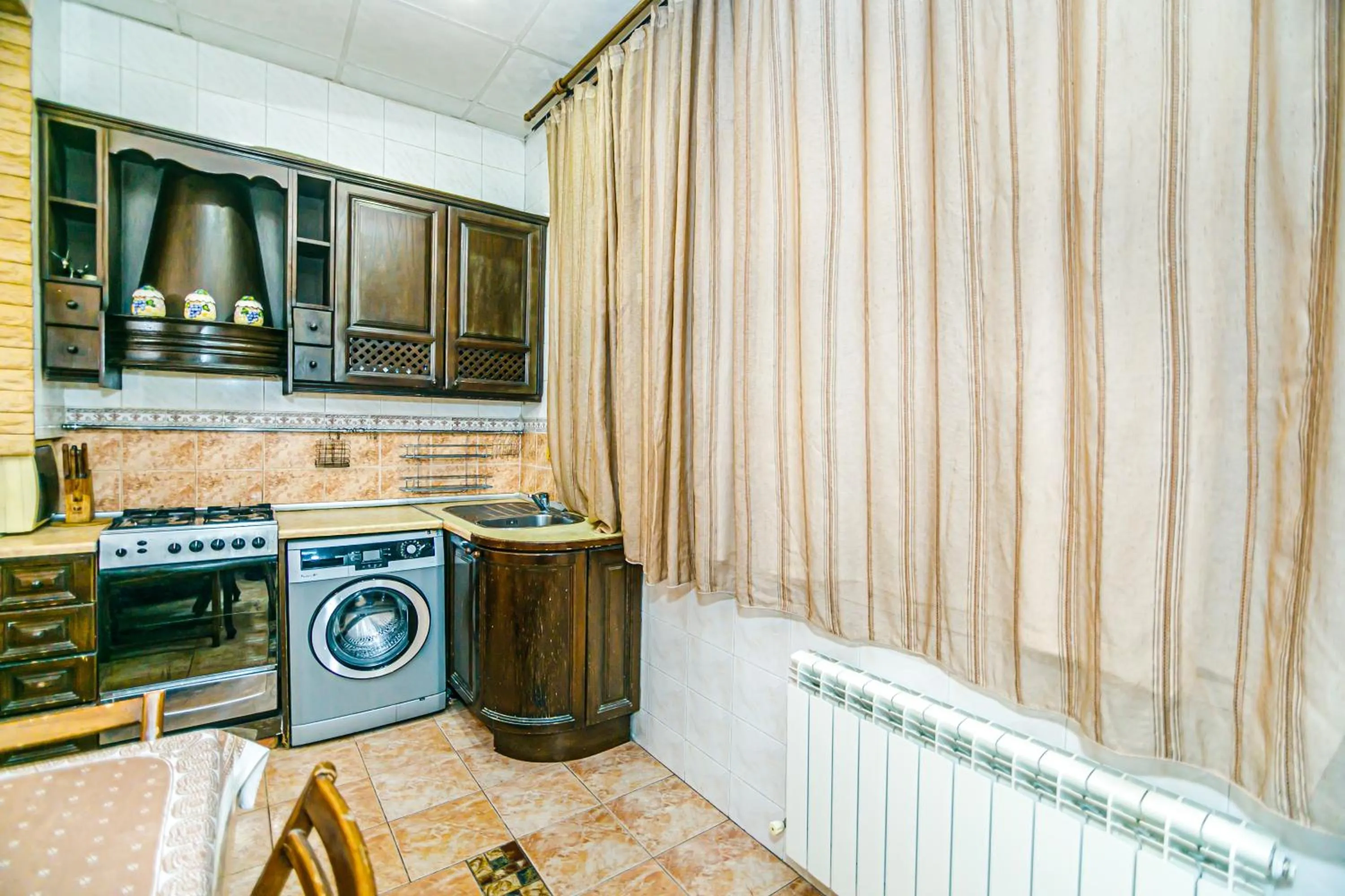 kitchen in Monolit Apartment