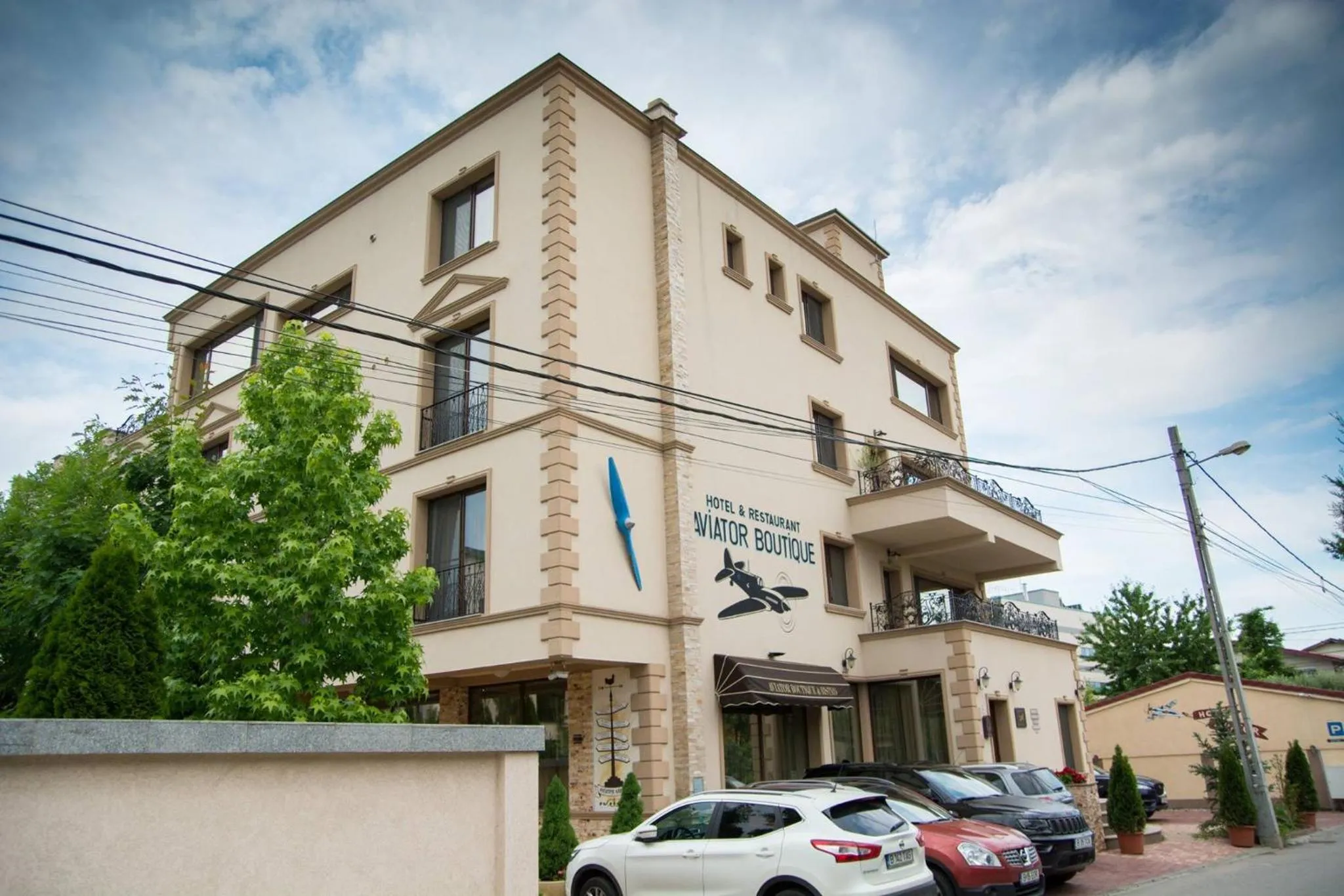 Property logo or sign in Hotel Aviator Boutique