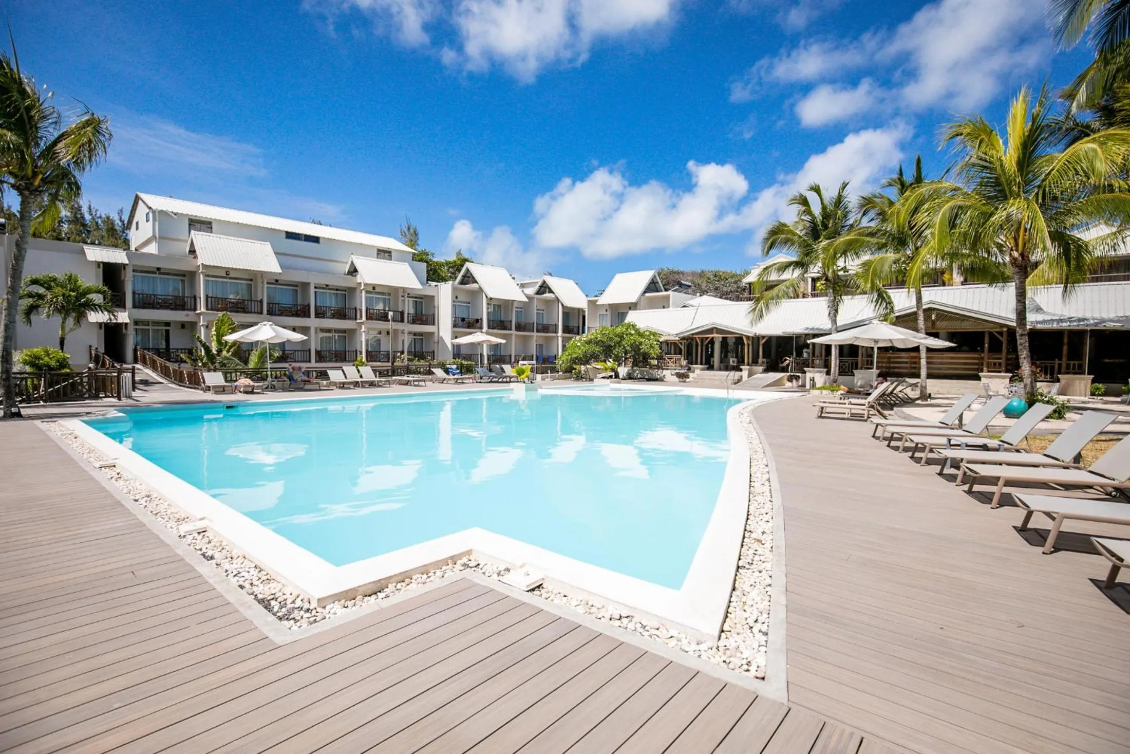 Swimming pool in Le Peninsula Bay Beach Resort & Spa