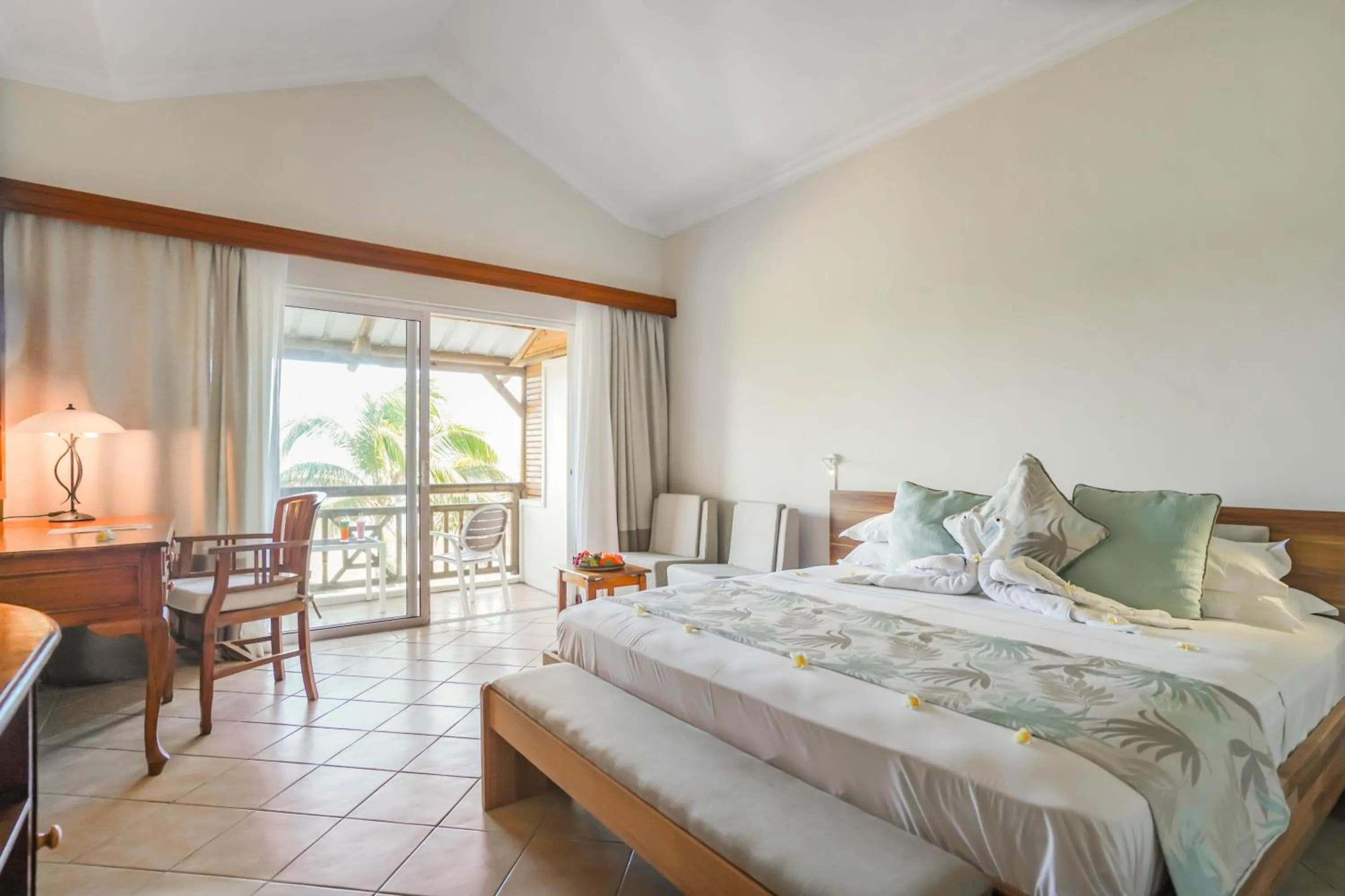 Bed in Le Peninsula Bay Beach Resort & Spa