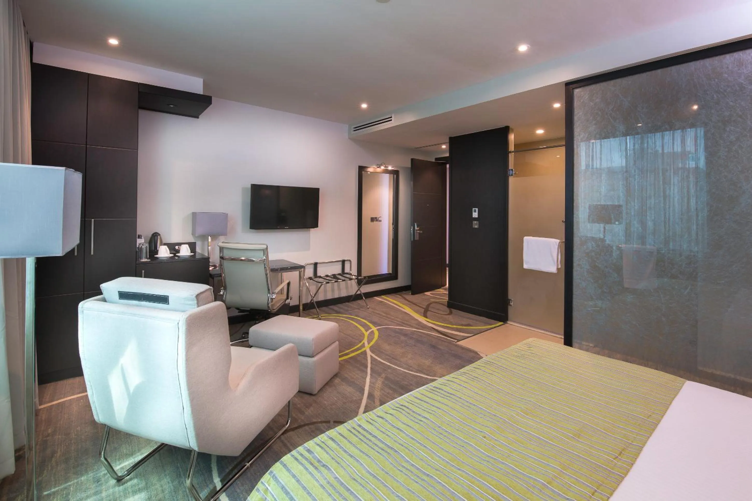 Photo of the whole room, Bed in Royal Tulip Canaan Nairobi