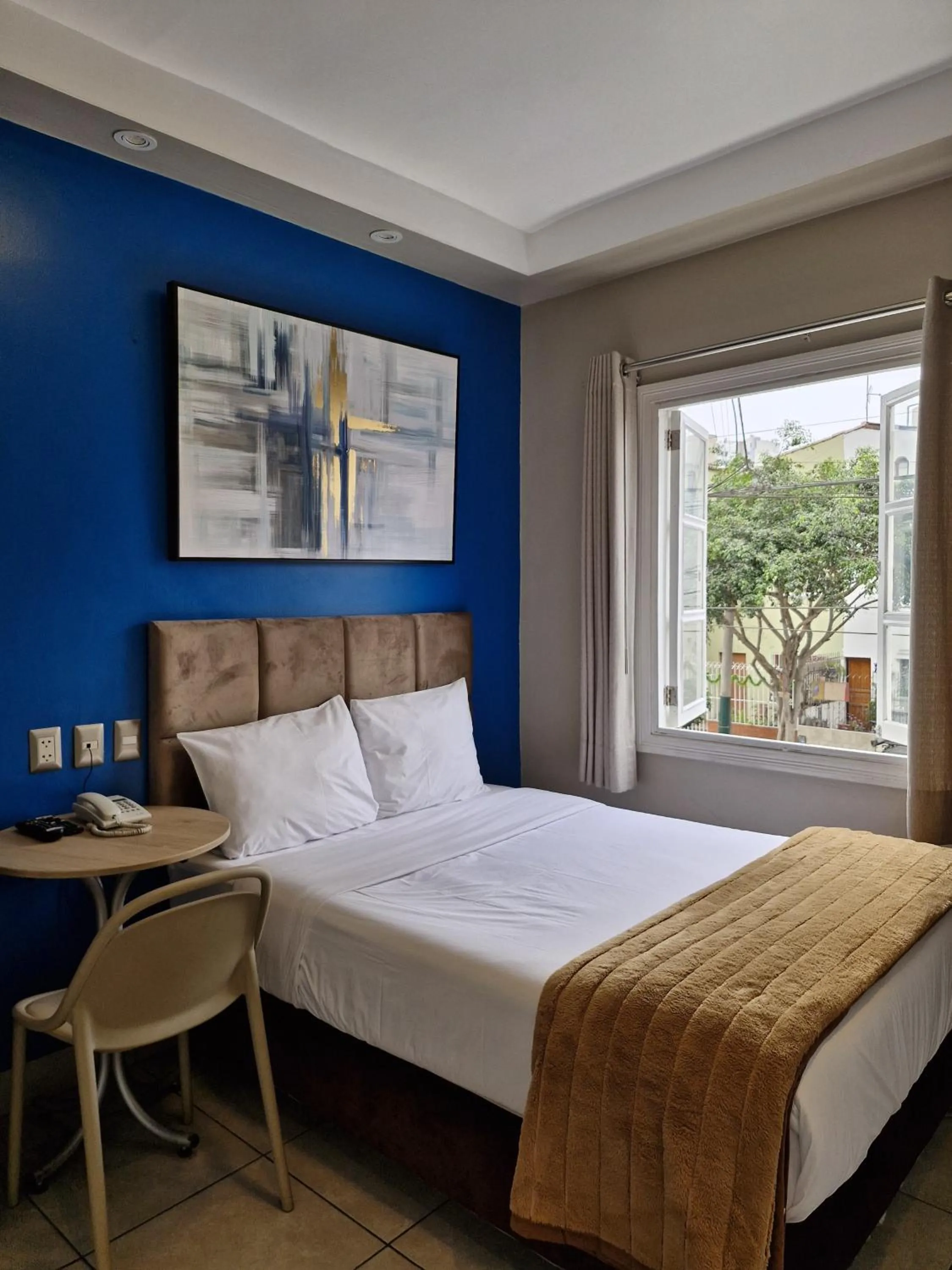 Bed in Residencial Alfa Hotel