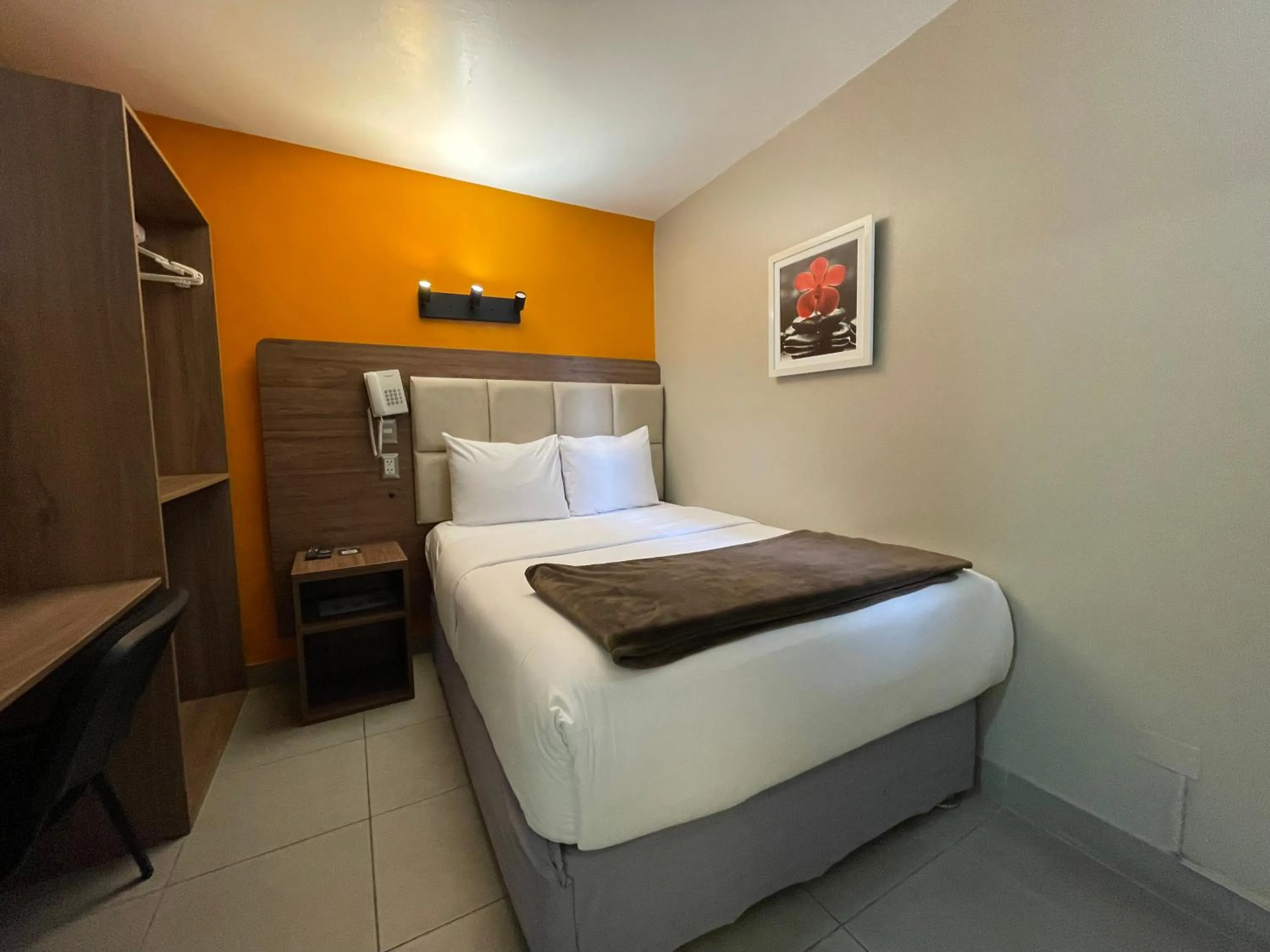 Bed in Residencial Alfa Hotel