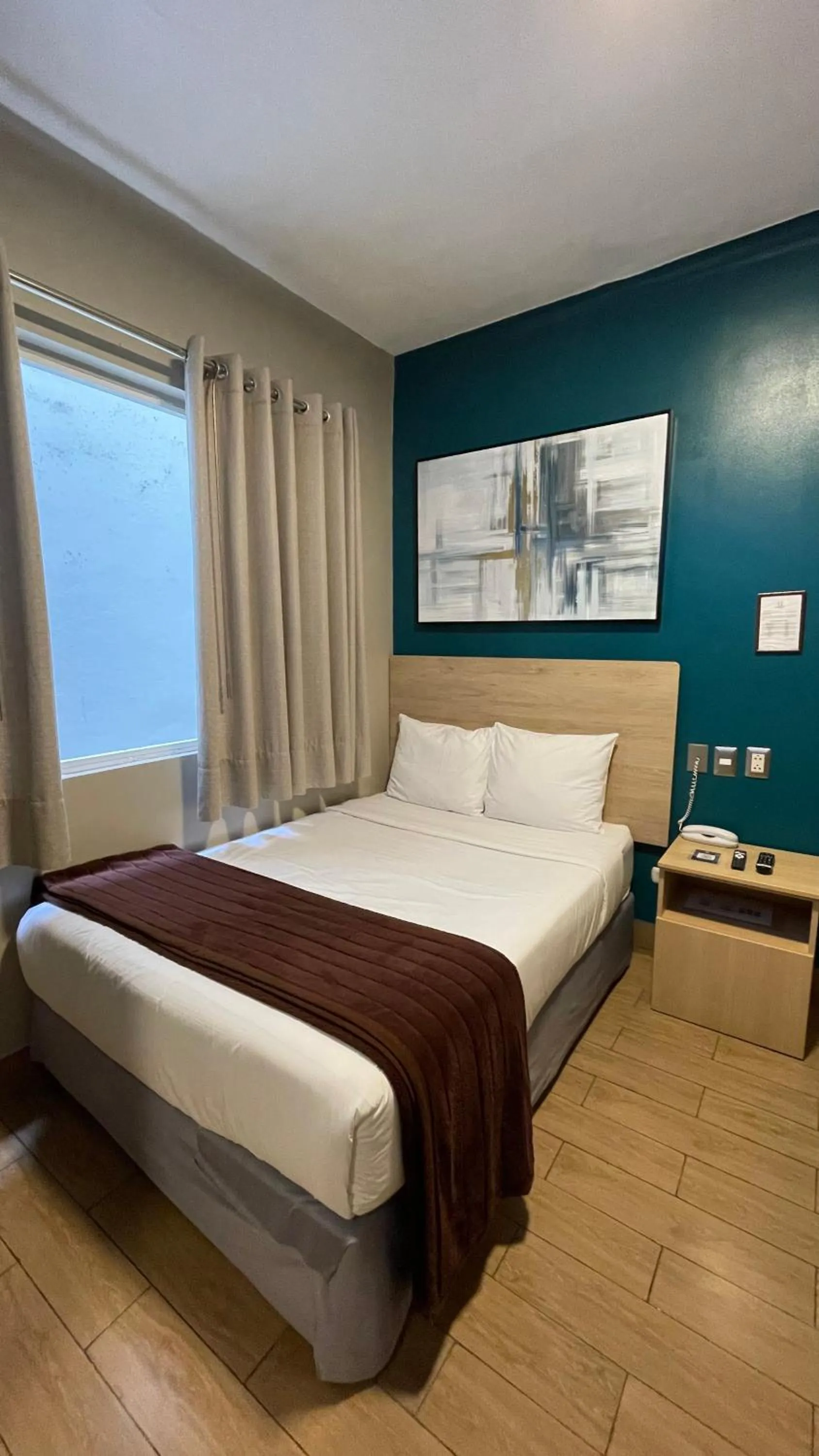 Bed in Residencial Alfa Hotel