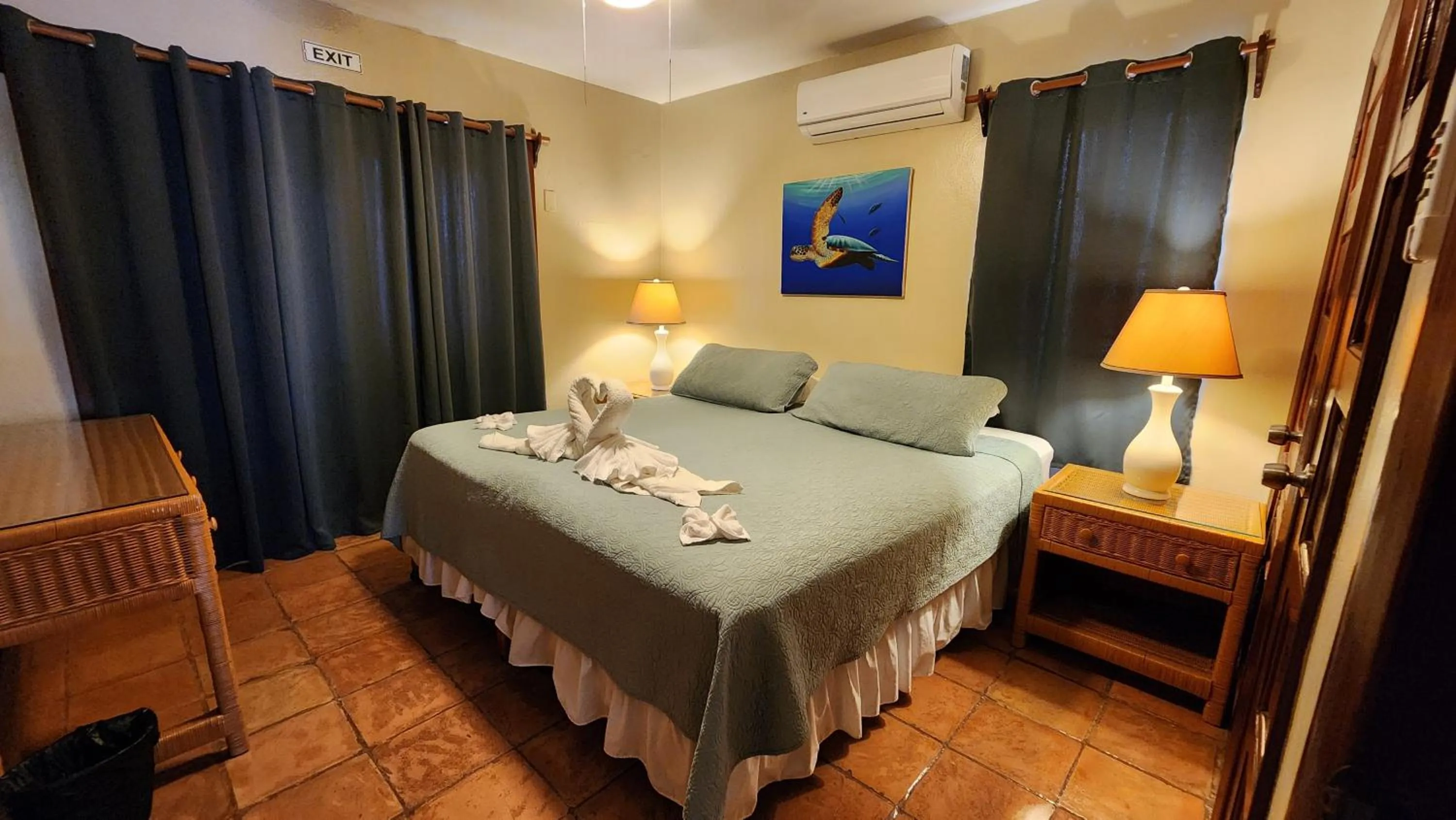 Bed in Tradewinds Paradise Villas
