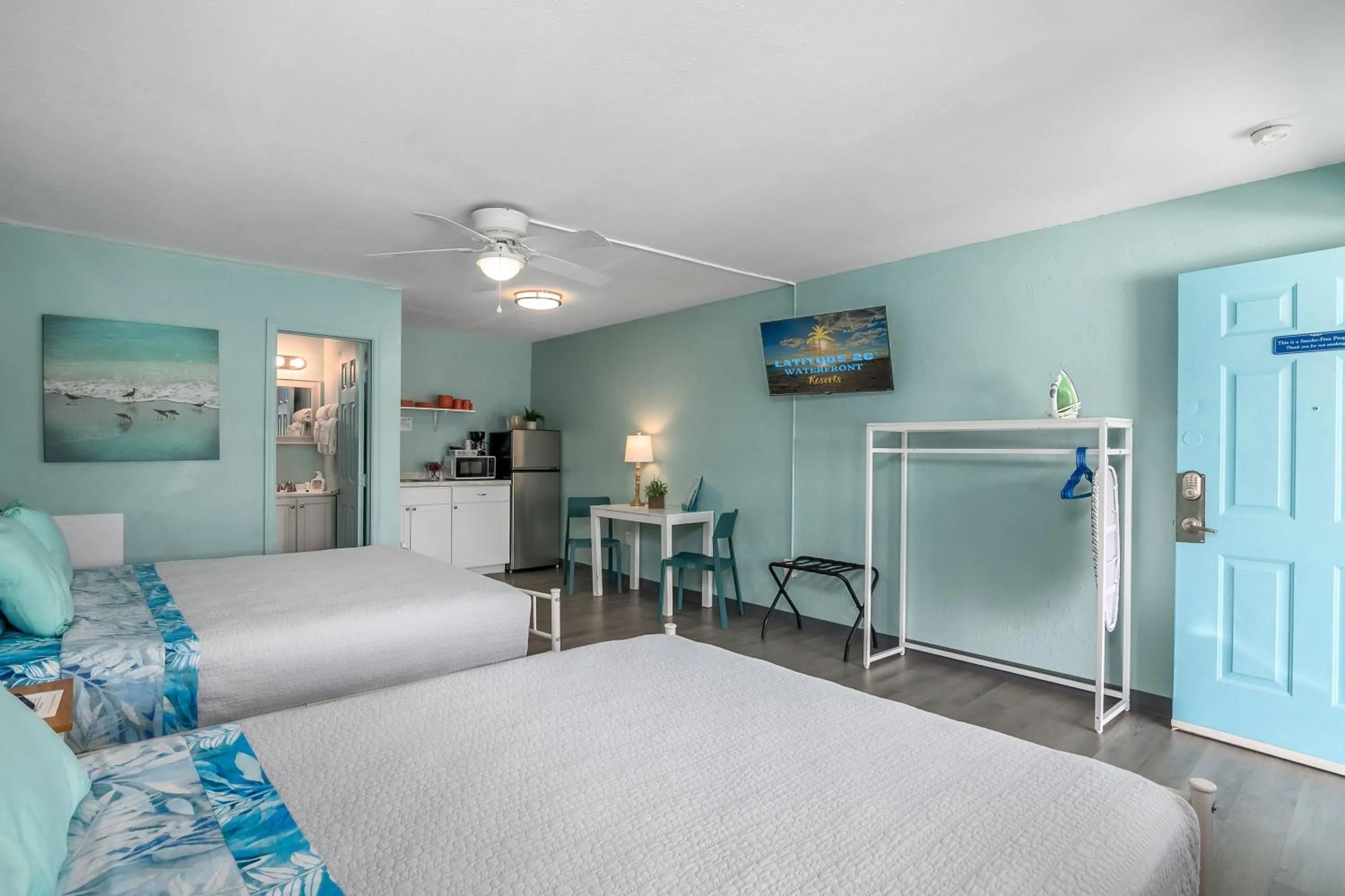 Bed in Latitude 26 Waterfront Boutique Resort - Fort Myers Beach