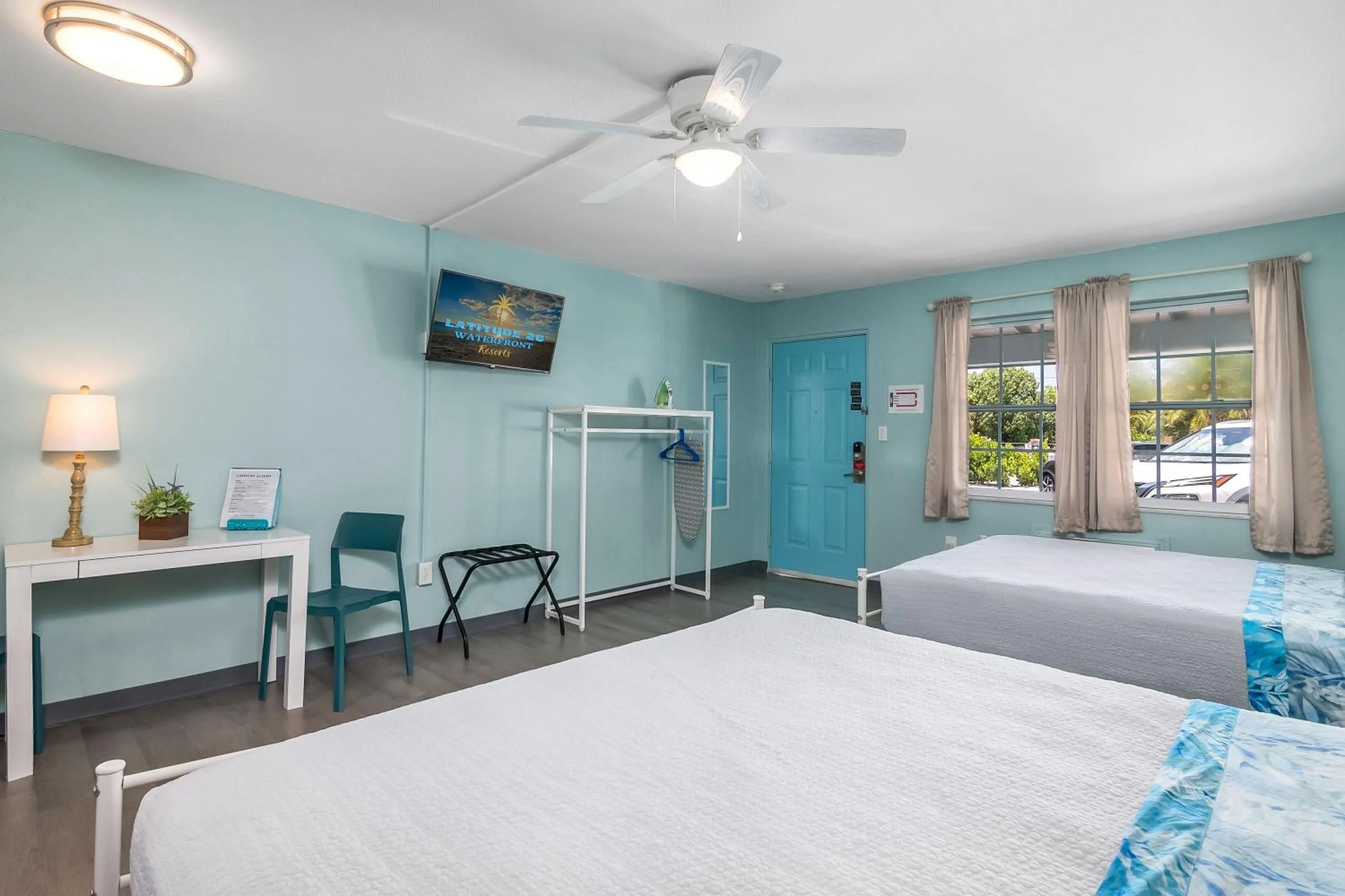 Bed in Latitude 26 Waterfront Boutique Resort - Fort Myers Beach