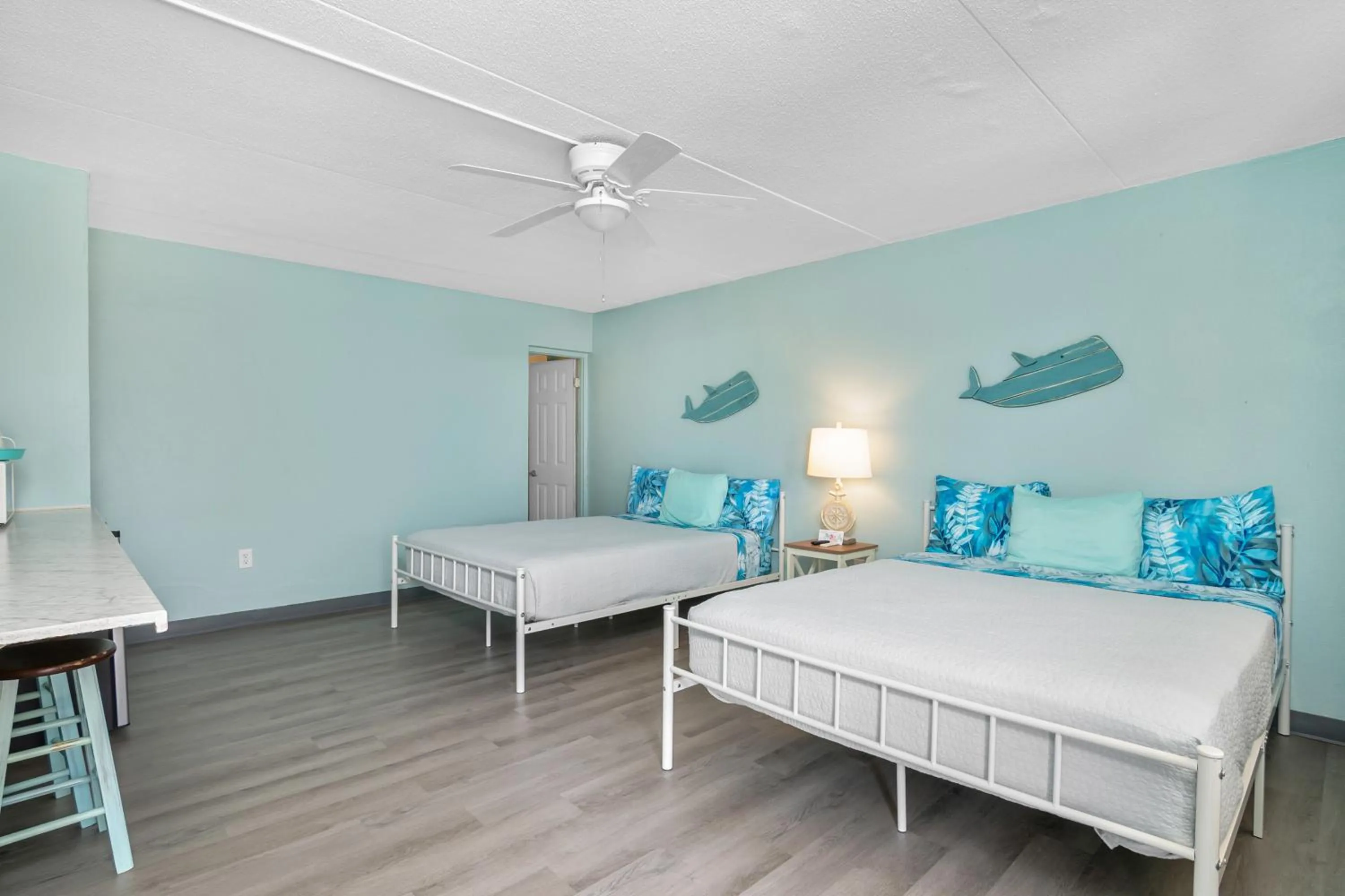 Photo of the whole room, Bed in Latitude 26 Waterfront Boutique Resort - Fort Myers Beach