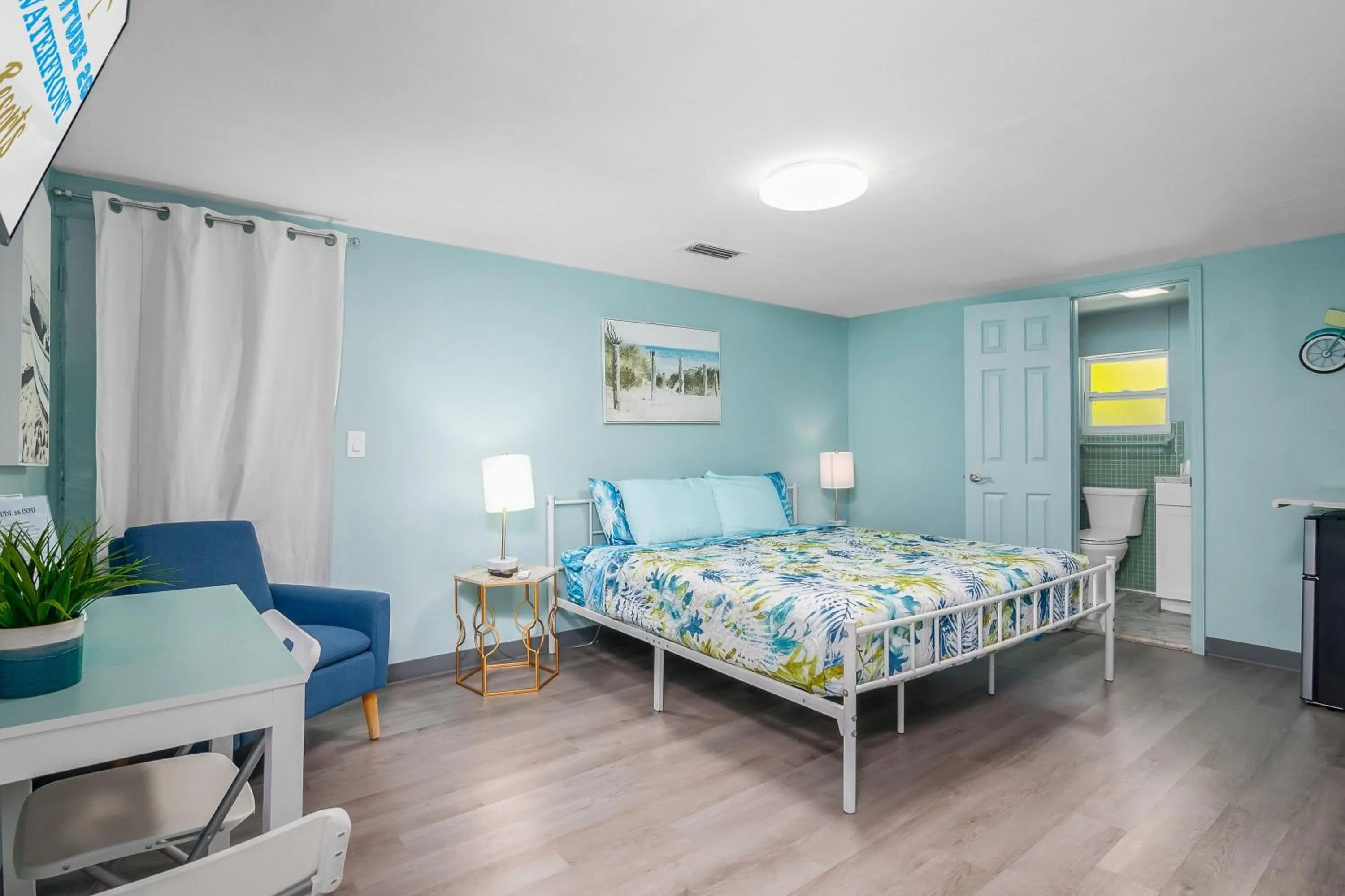 Bed in Latitude 26 Waterfront Boutique Resort - Fort Myers Beach