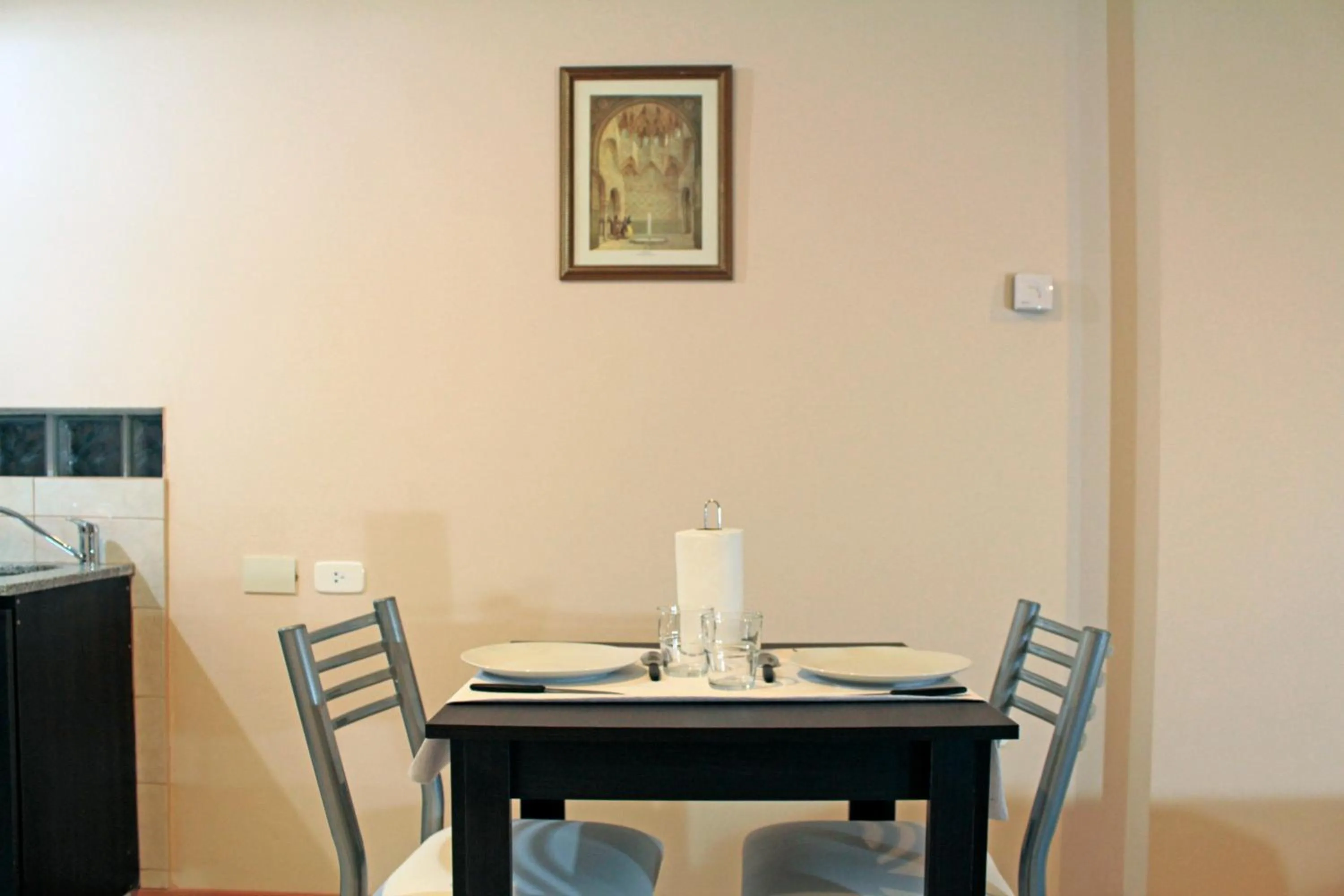 Dining area in Apart Hotel Granada