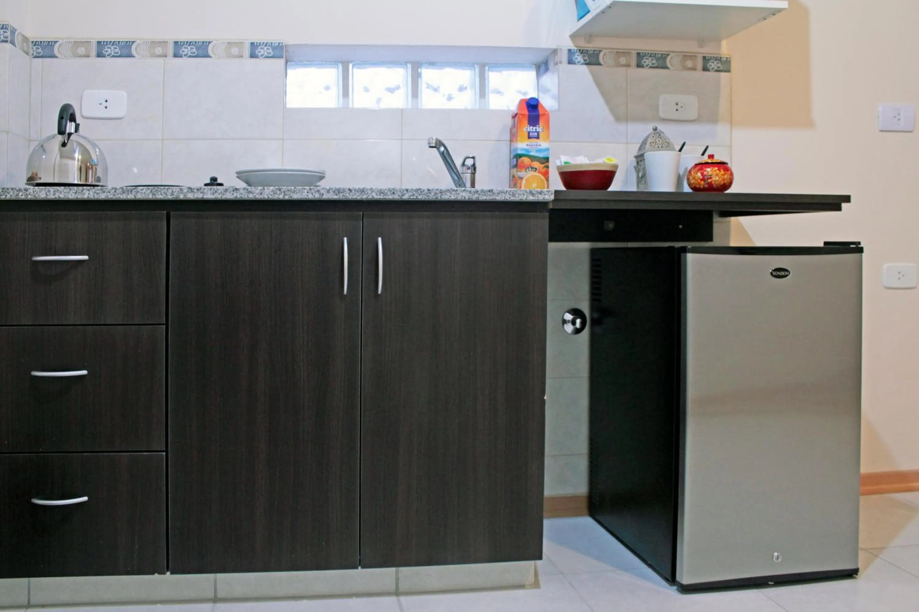 Kitchen or kitchenette in Apart Hotel Granada