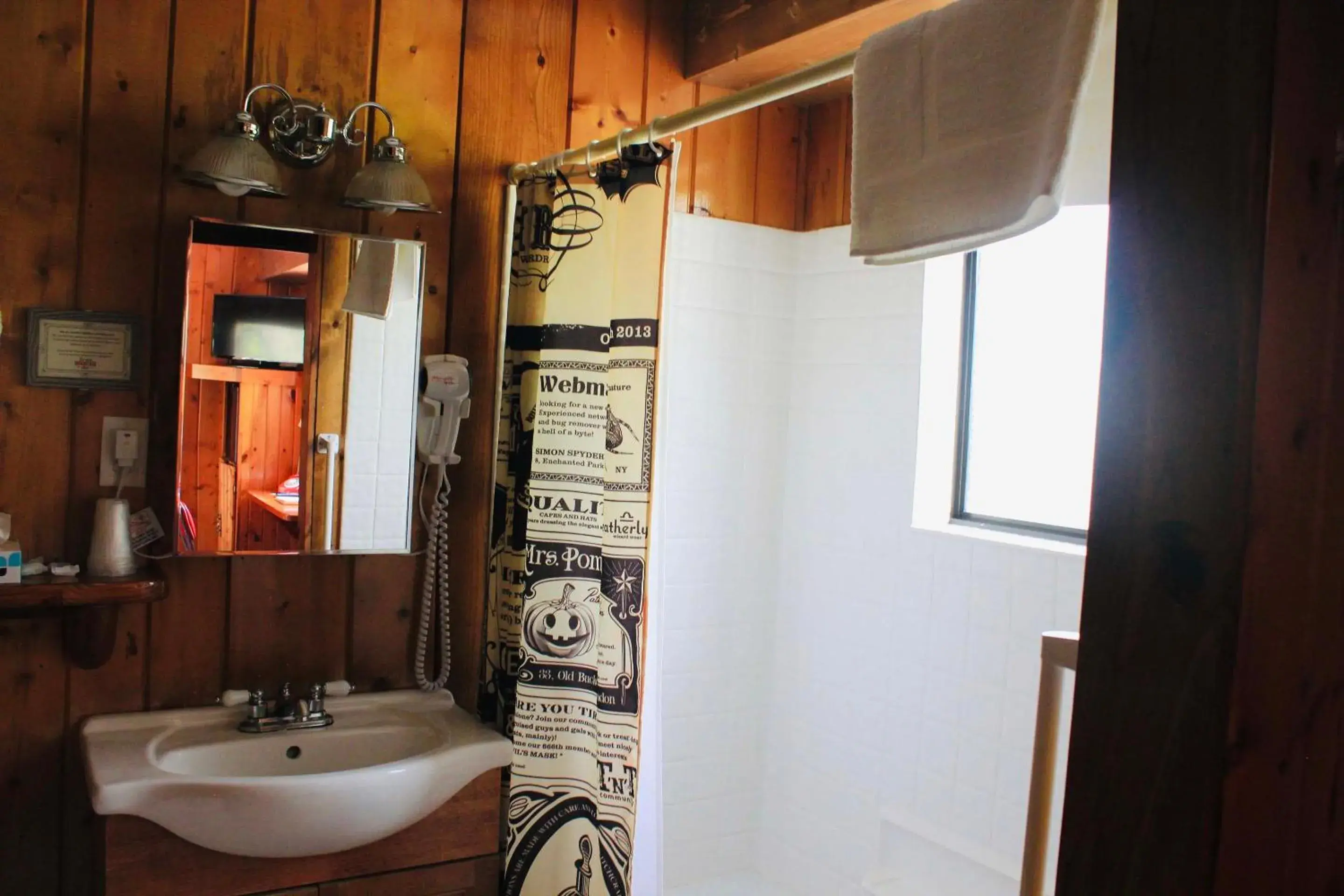 Bathroom in Foot of the Mountain Motel Bathroom in Foot of the Mountain Motel