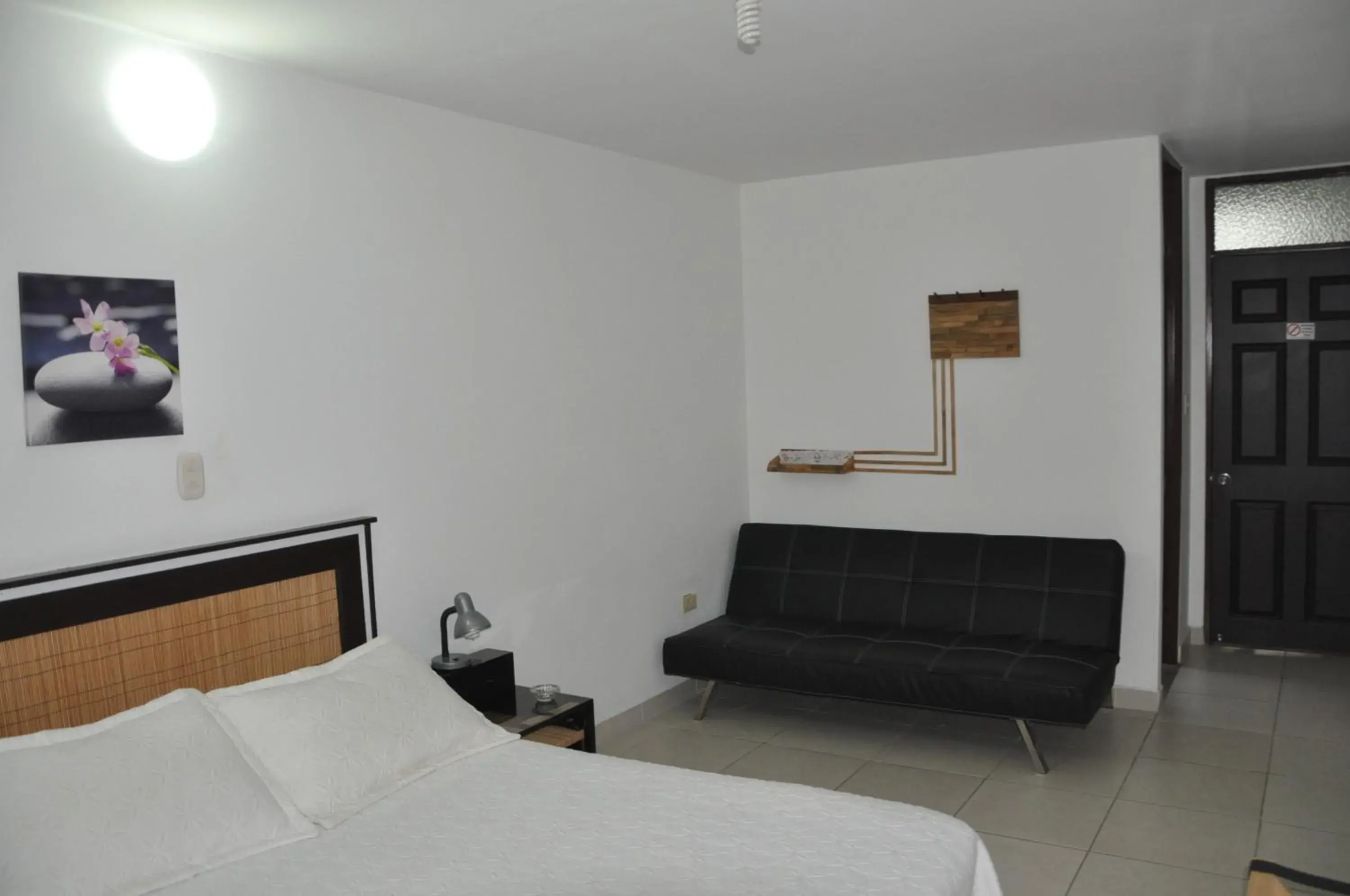 Deluxe Triple Room in Hotel Meson de las Flores Deluxe Triple Room in Hotel Meson de las Flores