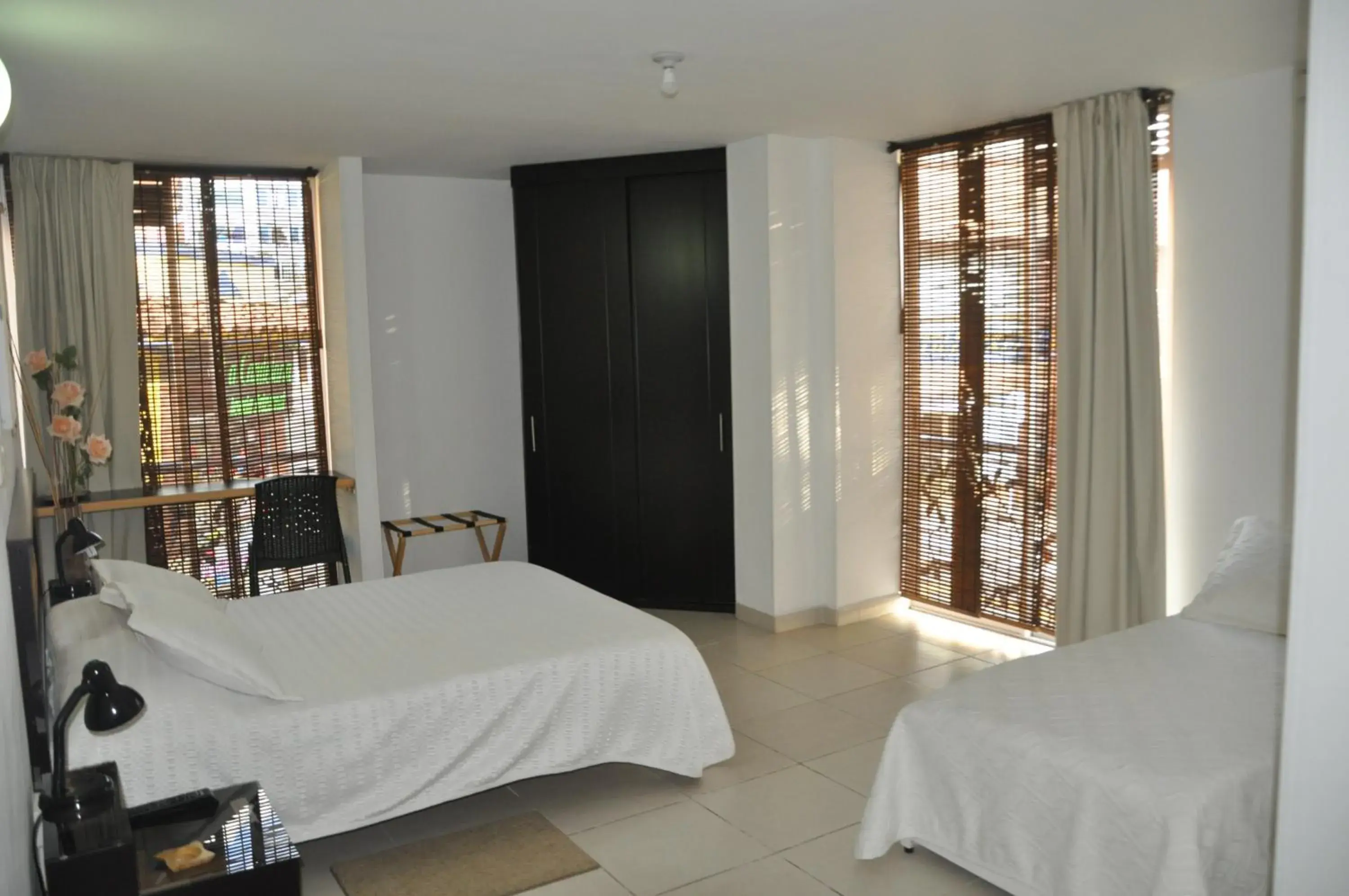 Classic Quadruple Room in Hotel Meson de las Flores Classic Quadruple Room in Hotel Meson de las Flores