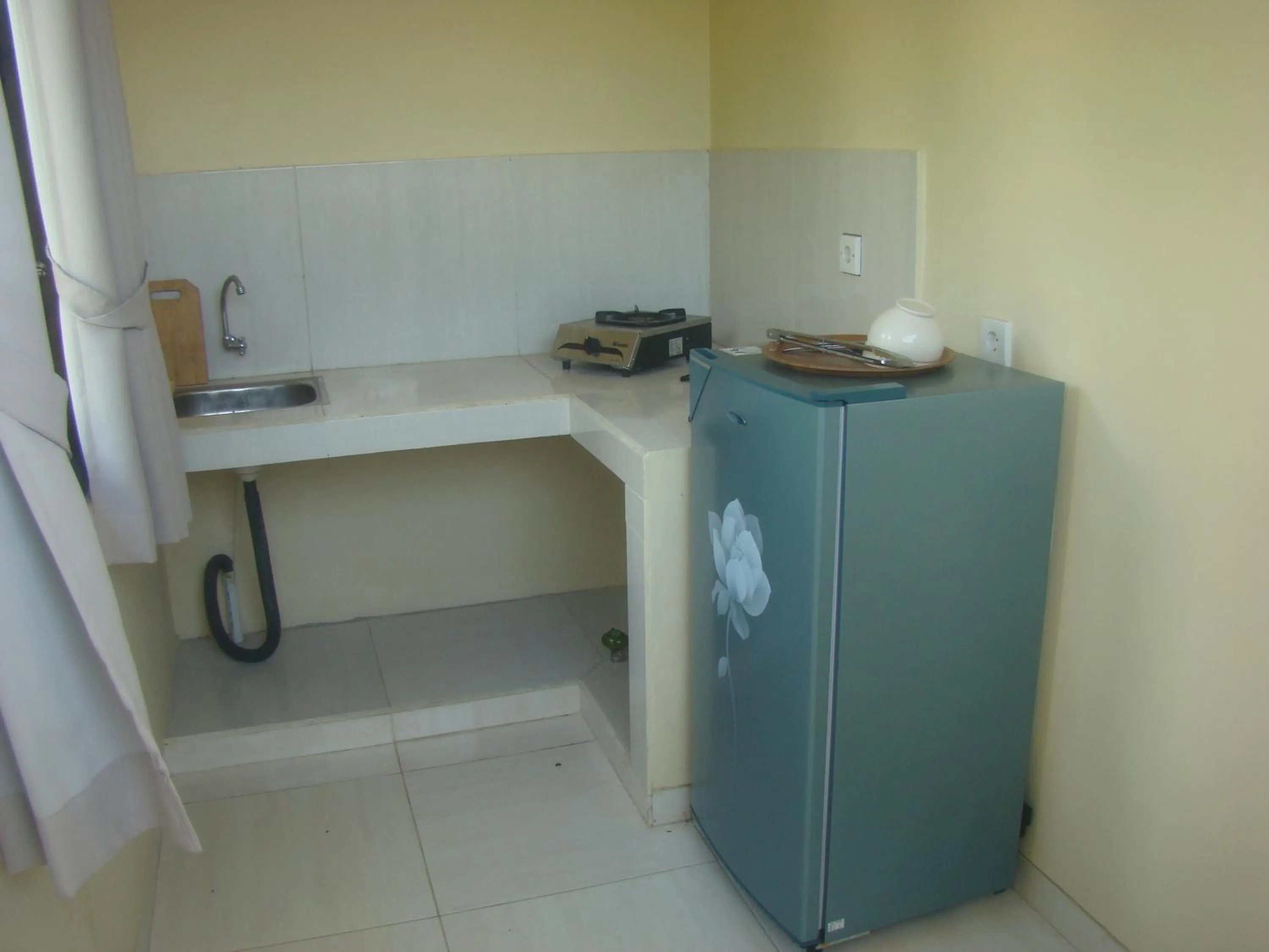 Kitchen or kitchenette in Taman Padi Villa