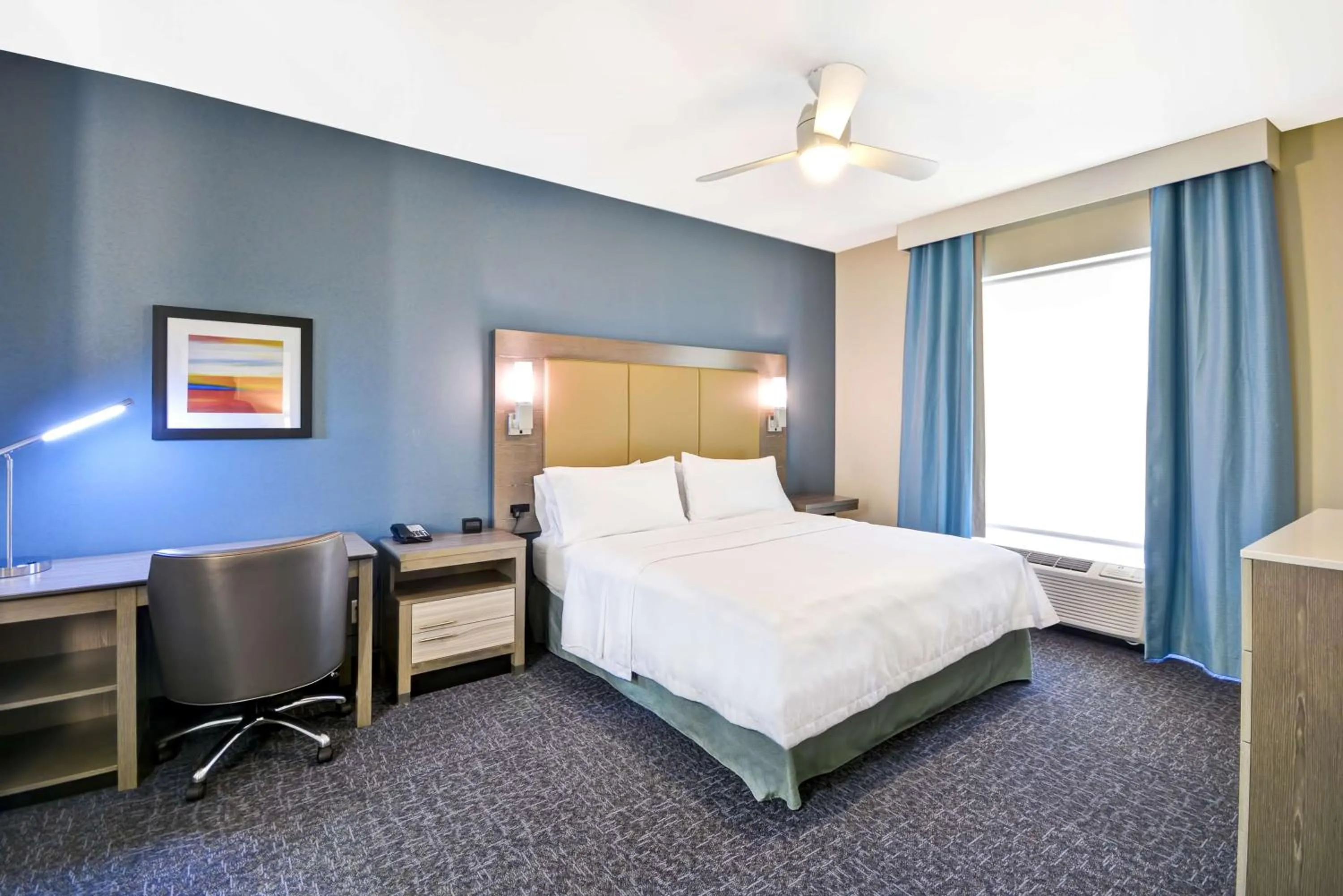 Bed in Homewood Suites by Hilton Orlando Theme Parks