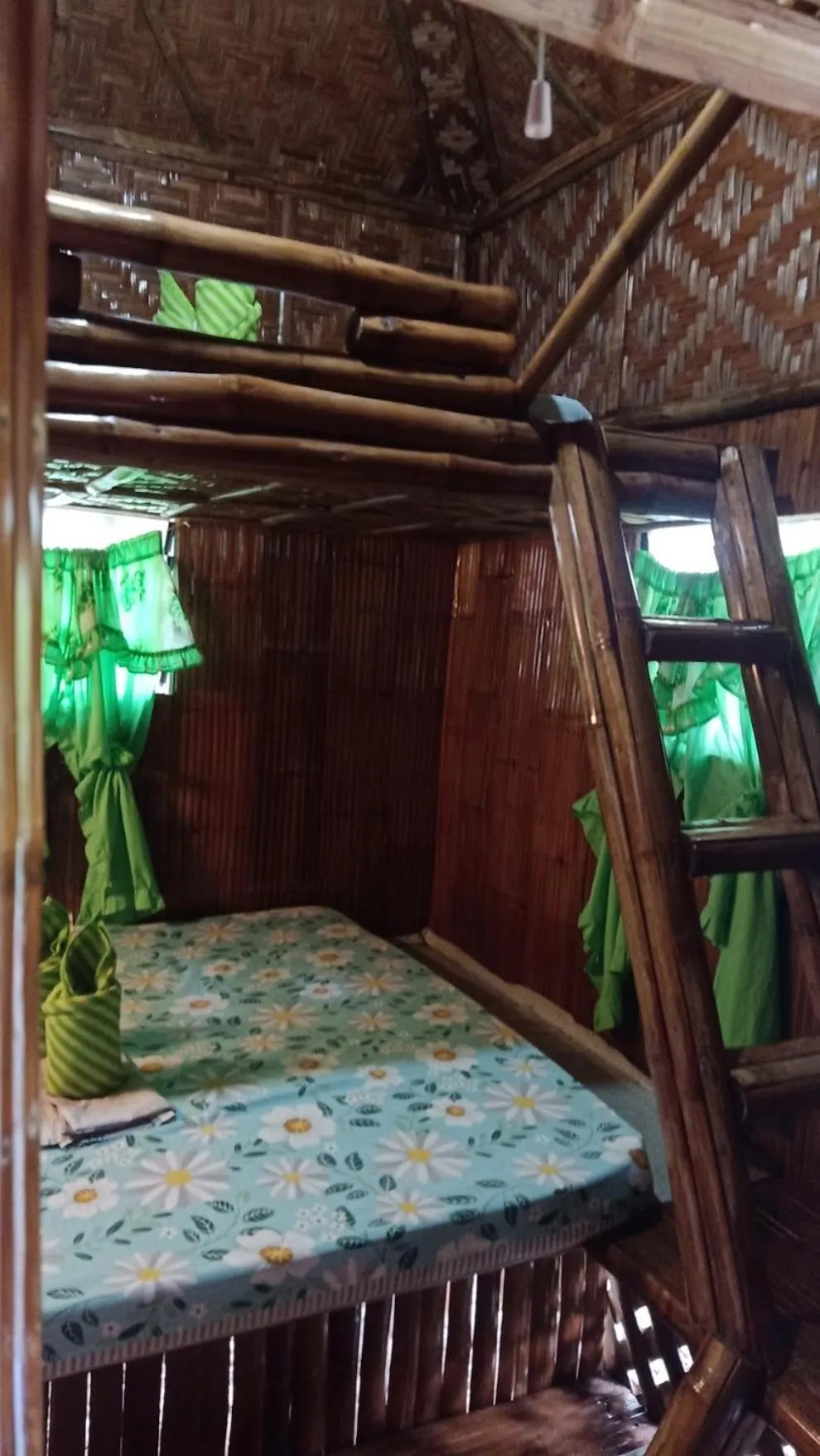 Bed in Moalboal Bamboo Guest House