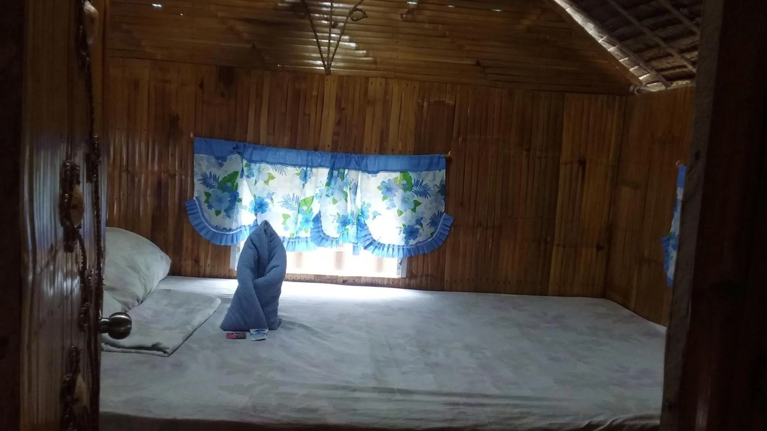 Bed in Moalboal Bamboo Guest House