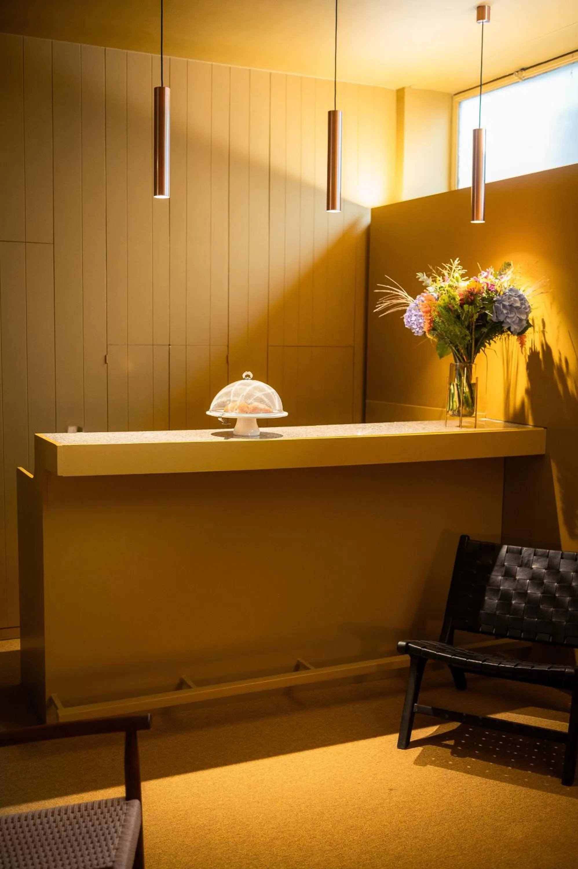 Communal lounge/ TV room in Hotel Queen Anne