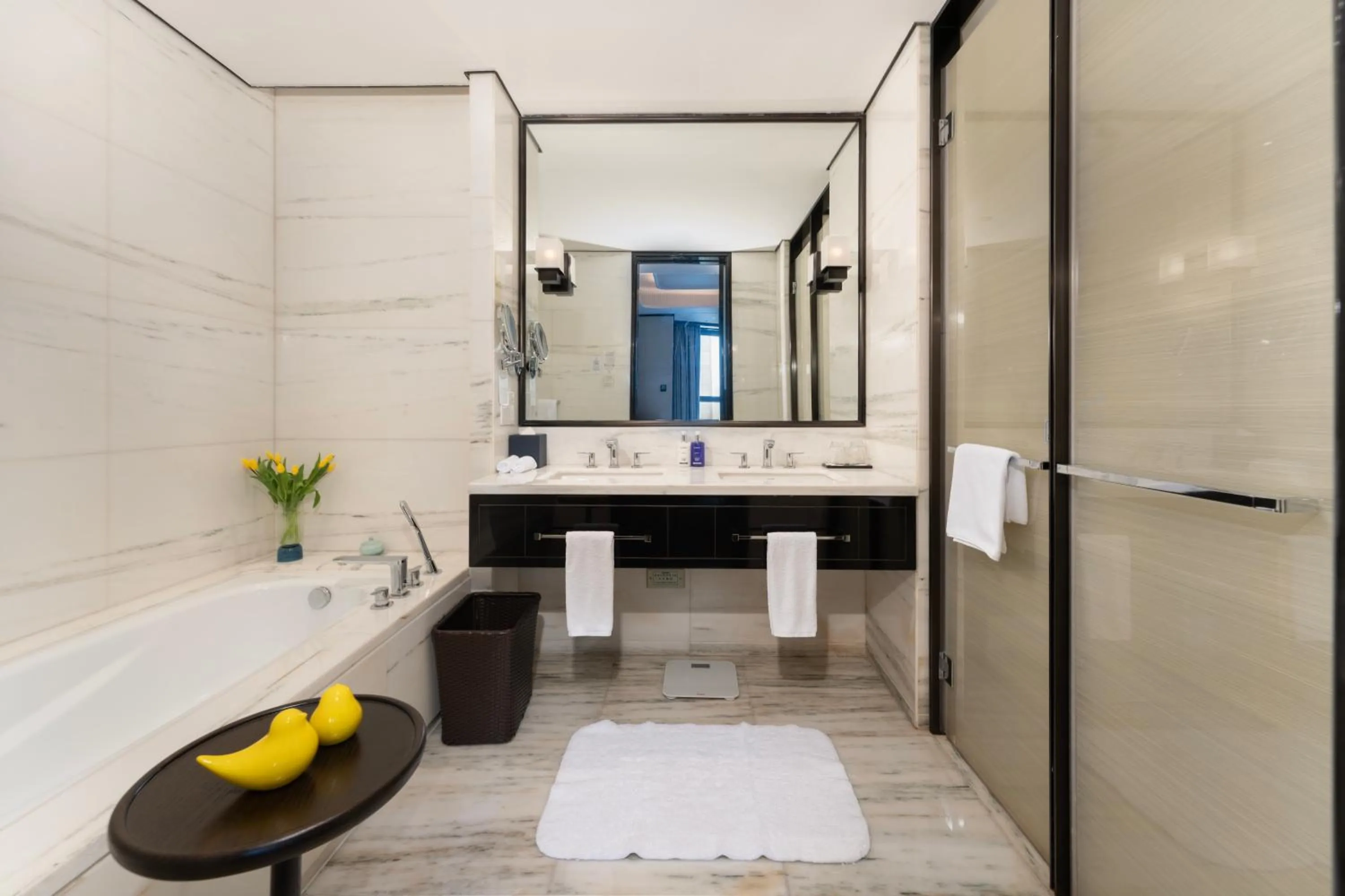 Bathroom in voco - Hangzhou Binjiang Minghao by IHG