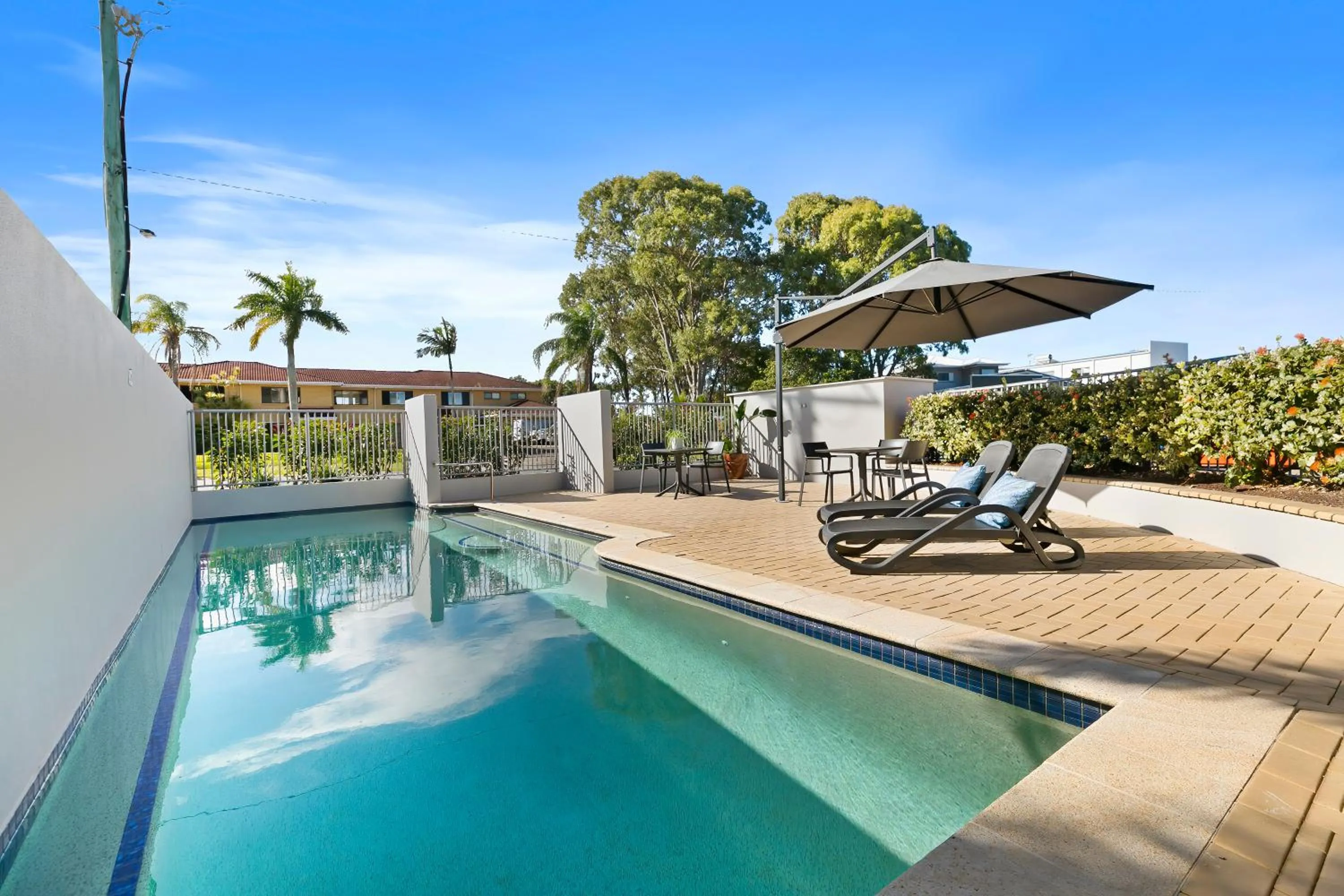 Swimming pool in On the Bay Apartments