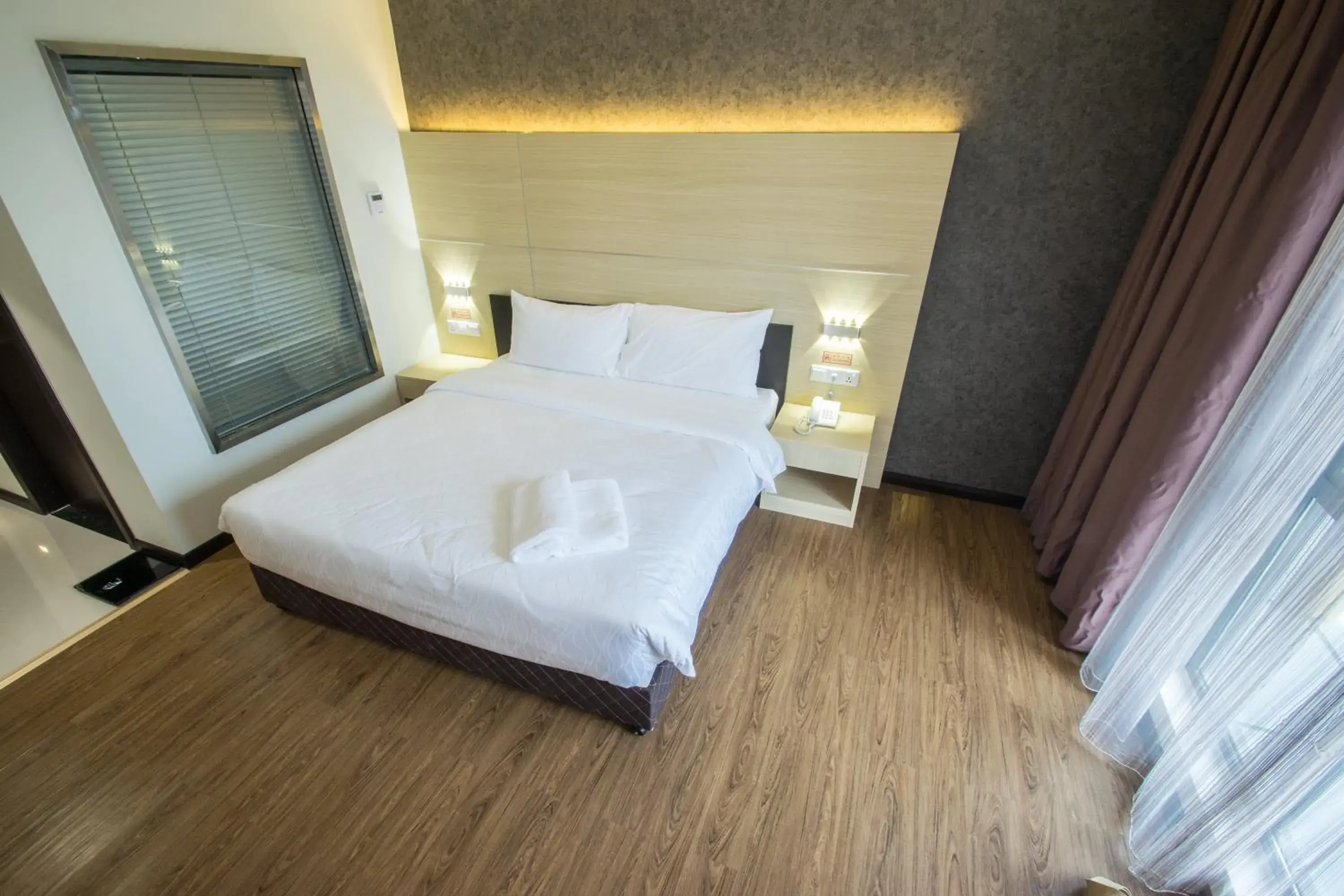 Bedroom, Bed in Hotel Labuan Point Bedroom, Bed in Hotel Labuan Point