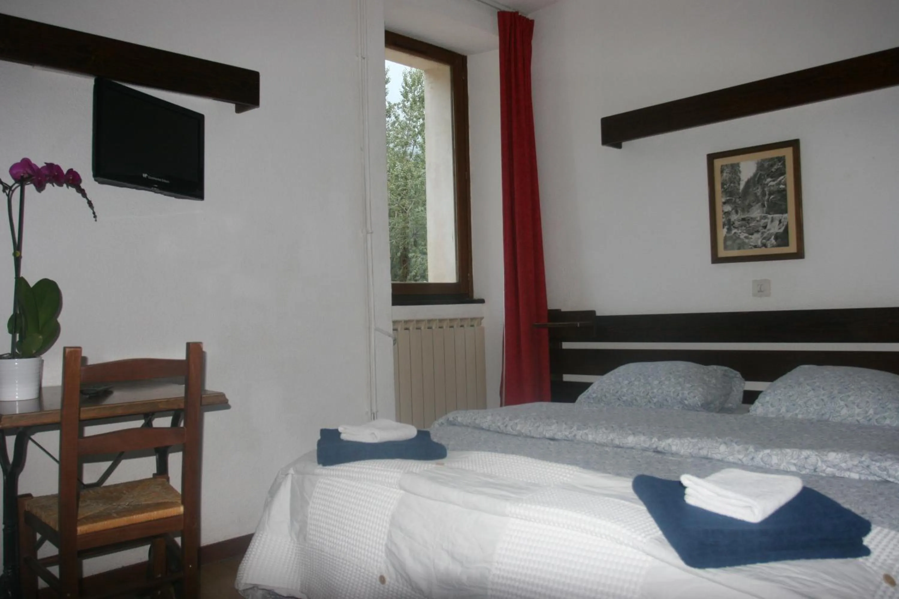 Bedroom in Hotel La Portette