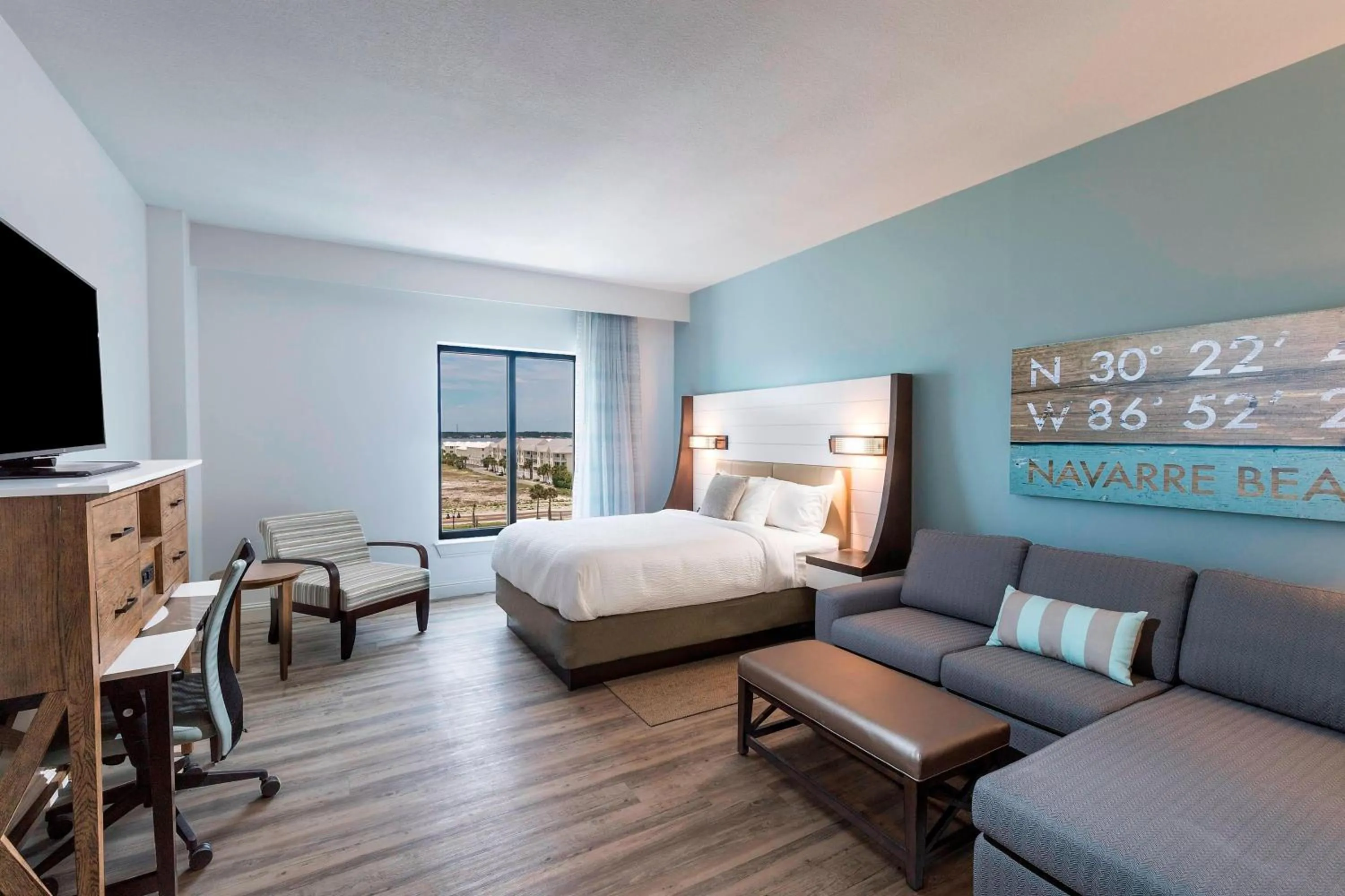 Photo of the whole room, Bed in SpringHill Suites by Marriott Navarre Oceanfront