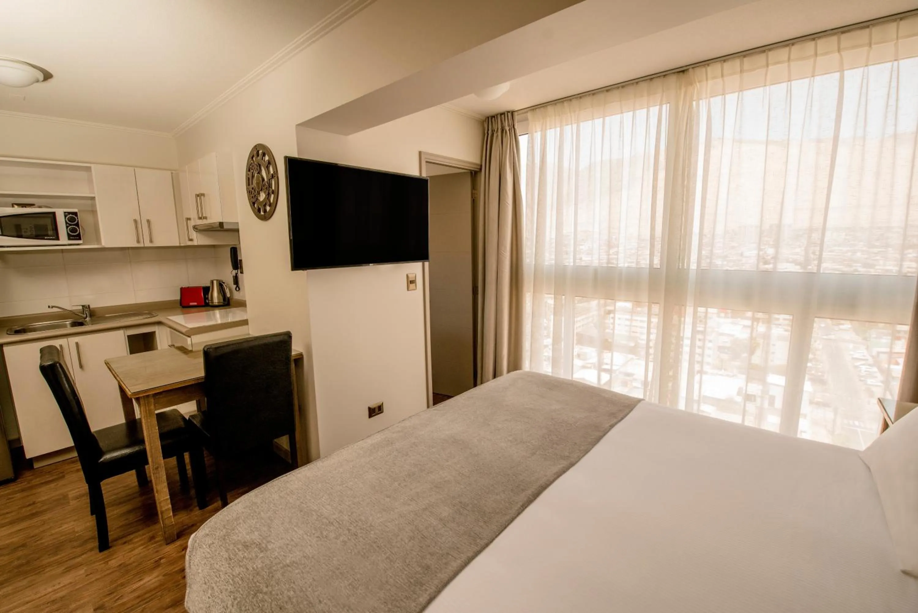 Photo of the whole room, Bed in Gran Cavancha Hotel & Apartment