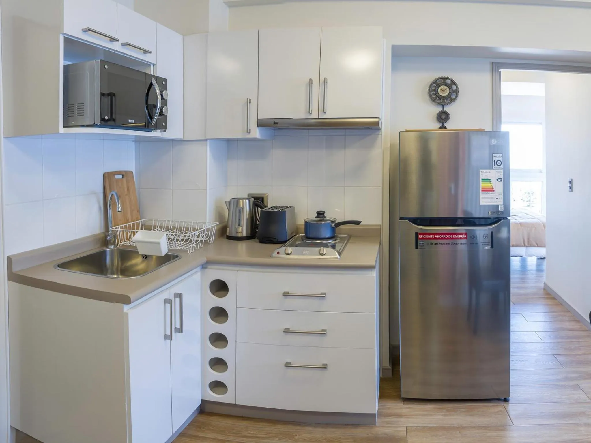 Kitchen or kitchenette in Gran Cavancha Hotel & Apartment