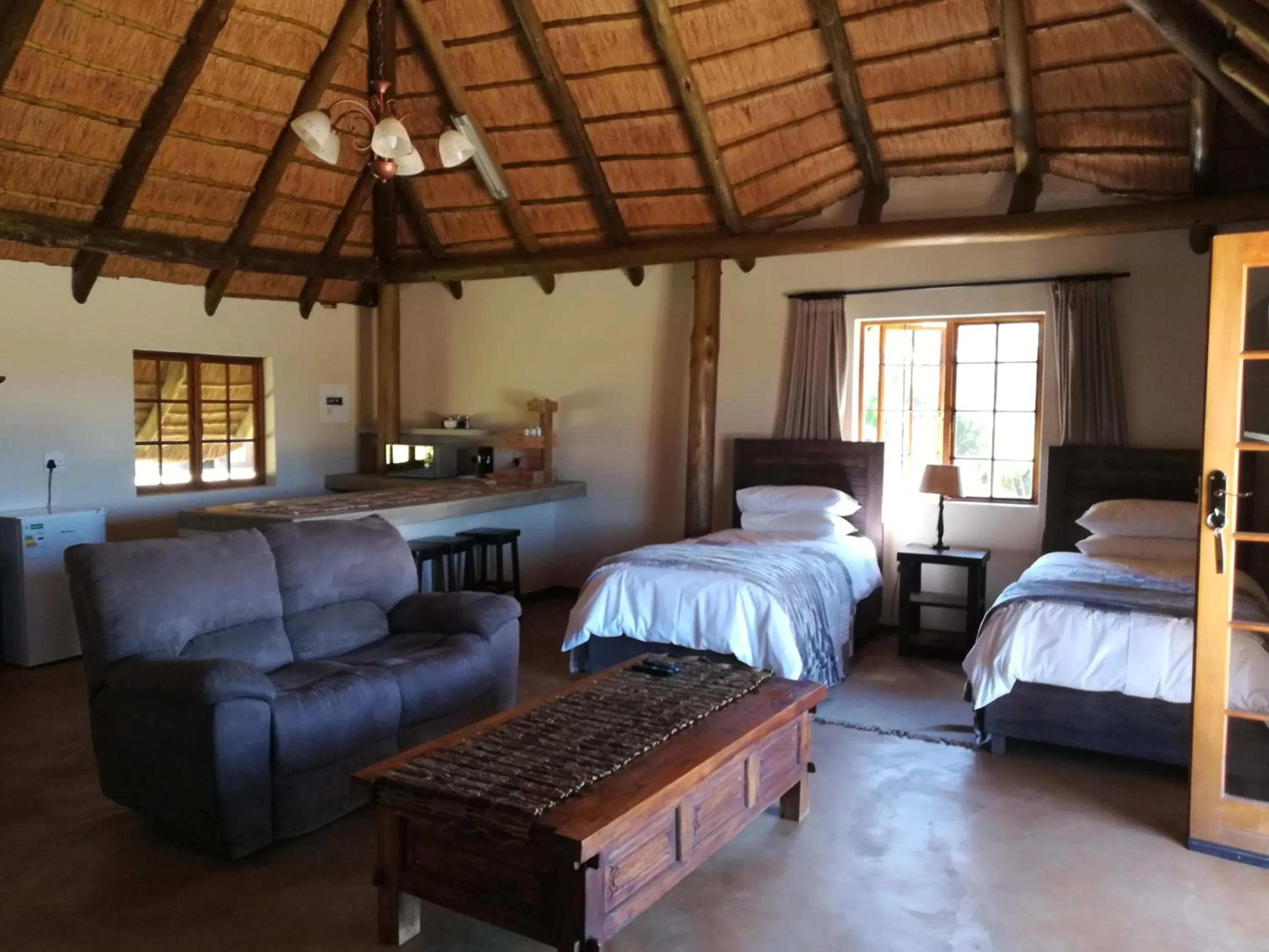 Bed in African Flair Country Lodge