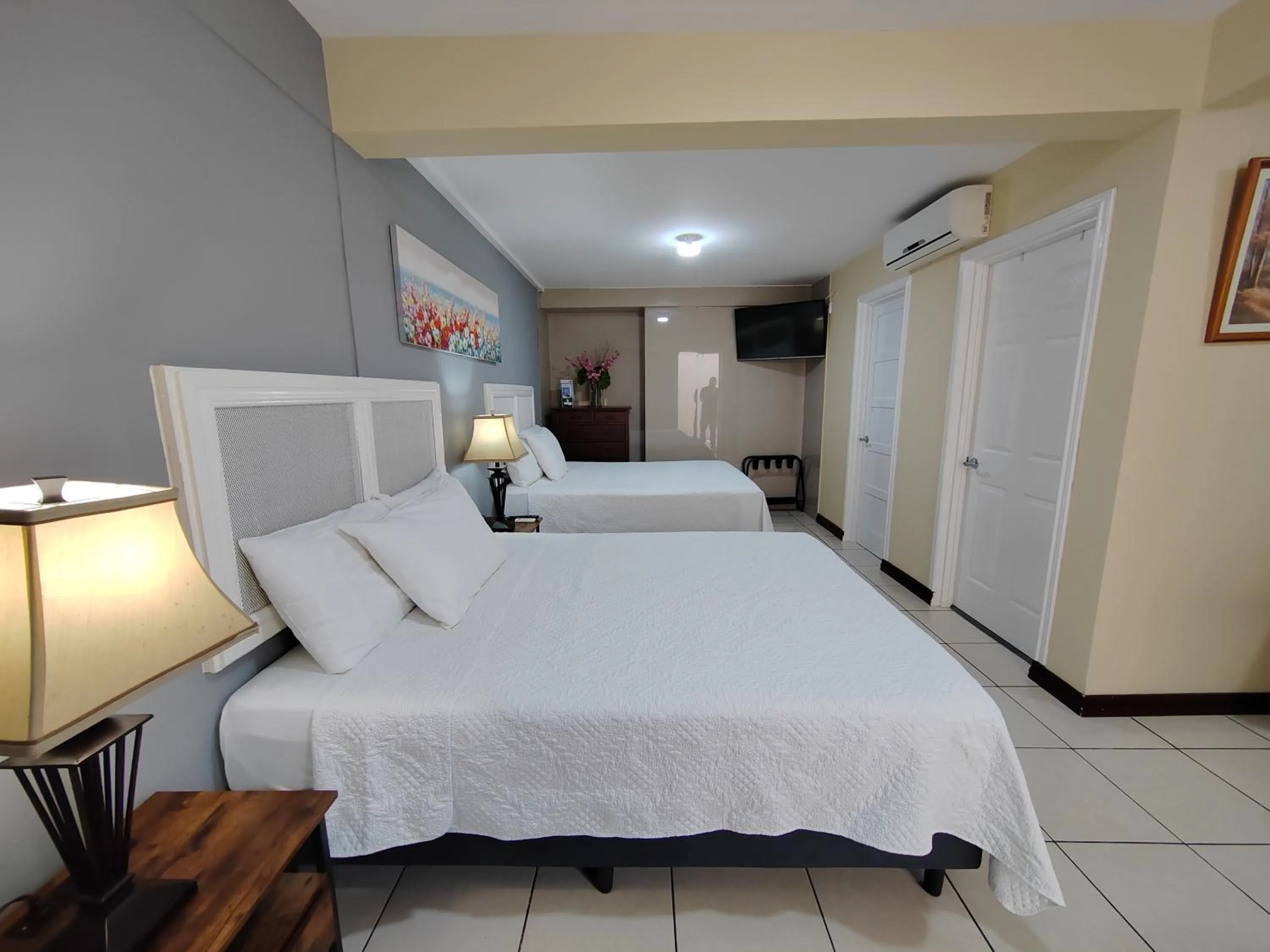 Bed in Hotel Bamboo Aeropuerto